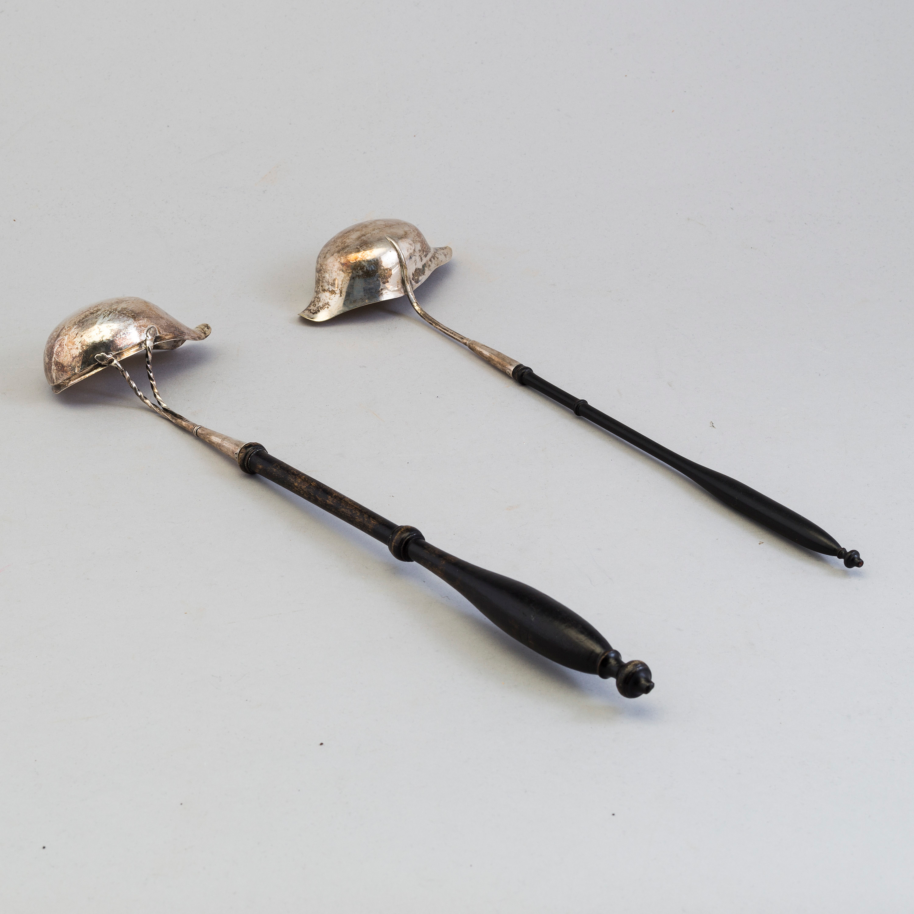 TWO SILVER PUNCH LADLES, first half of the 19th century. Bukowskis