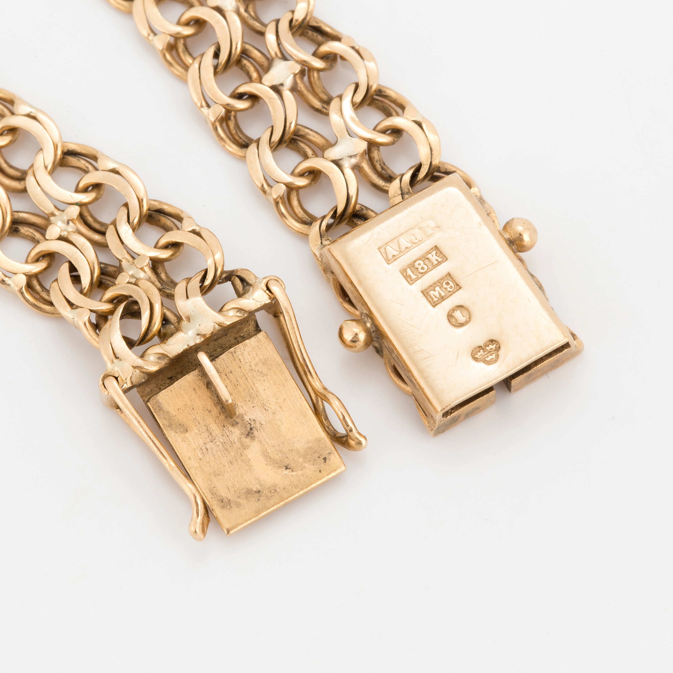 ARMBAND 18 karat guld. Bukowskis