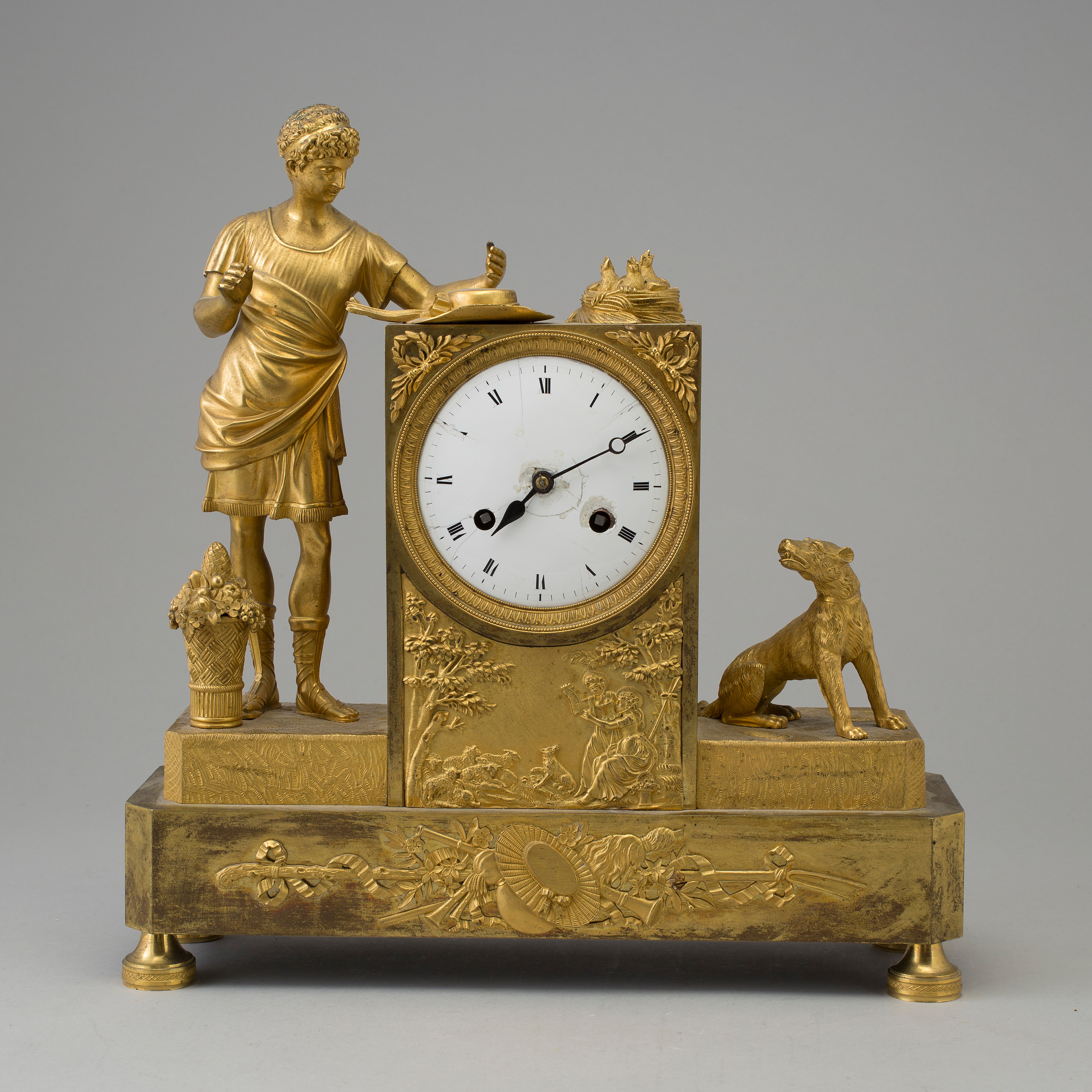 A French Empire early 19th century mantel clock. Bukowskis