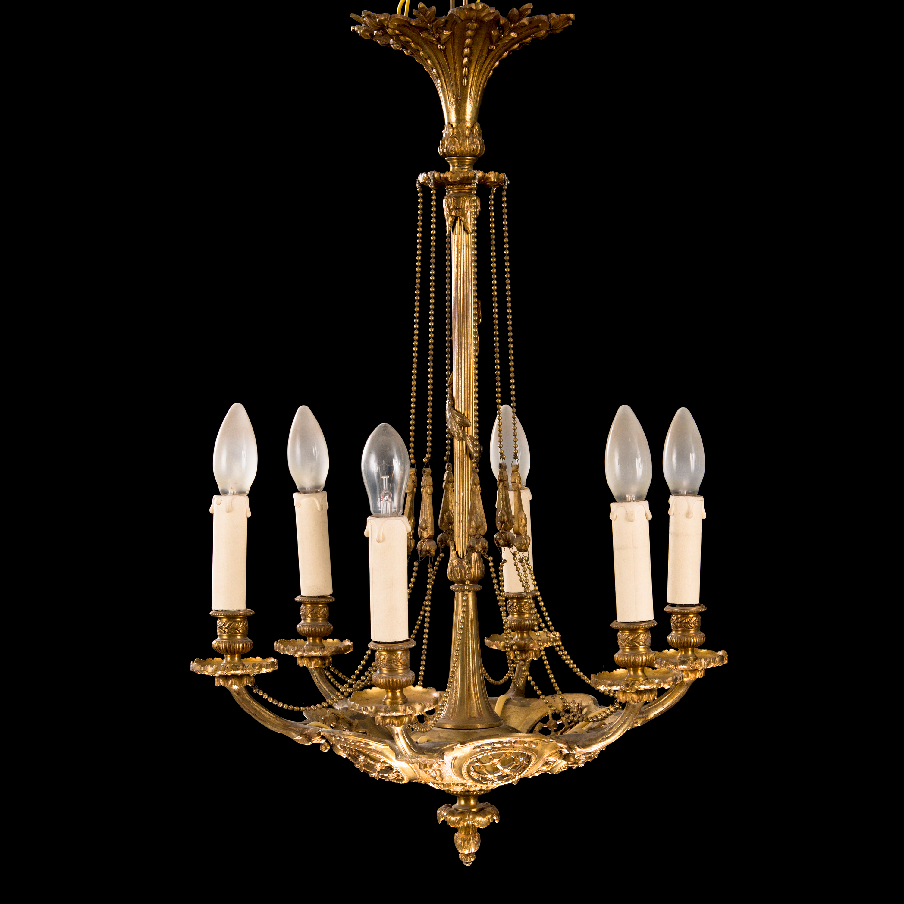 A brass and bronze chandelier, first half of the 20th Century. Bukowskis