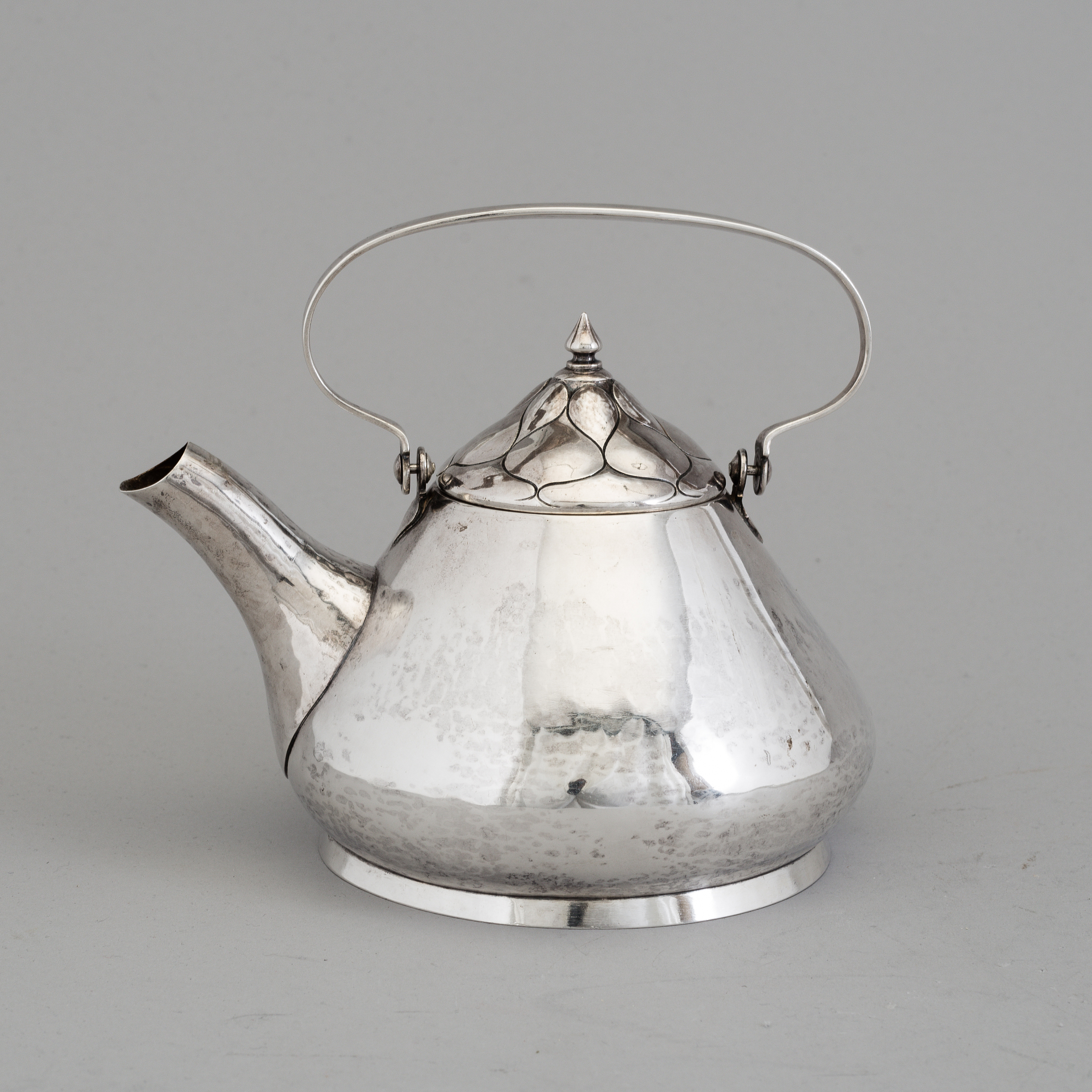 A Swedish Art Nouveau silver teapot, maker's mark CG Hallberg, Malmö