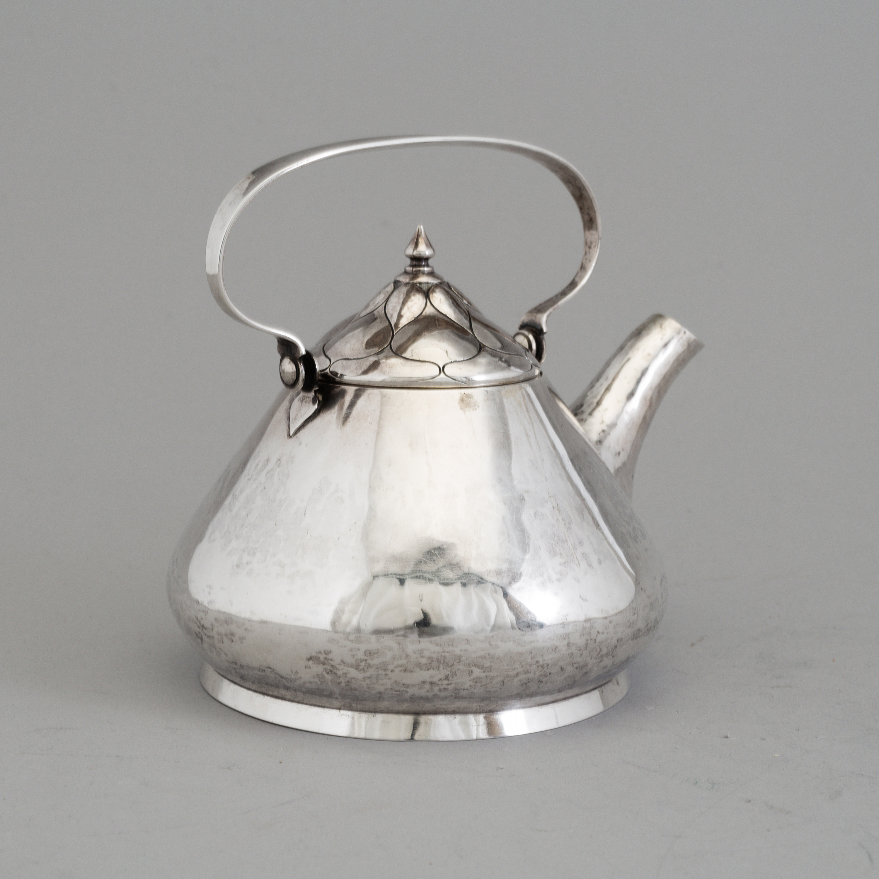 A Swedish Art Nouveau silver teapot, maker's mark CG Hallberg, Malmö