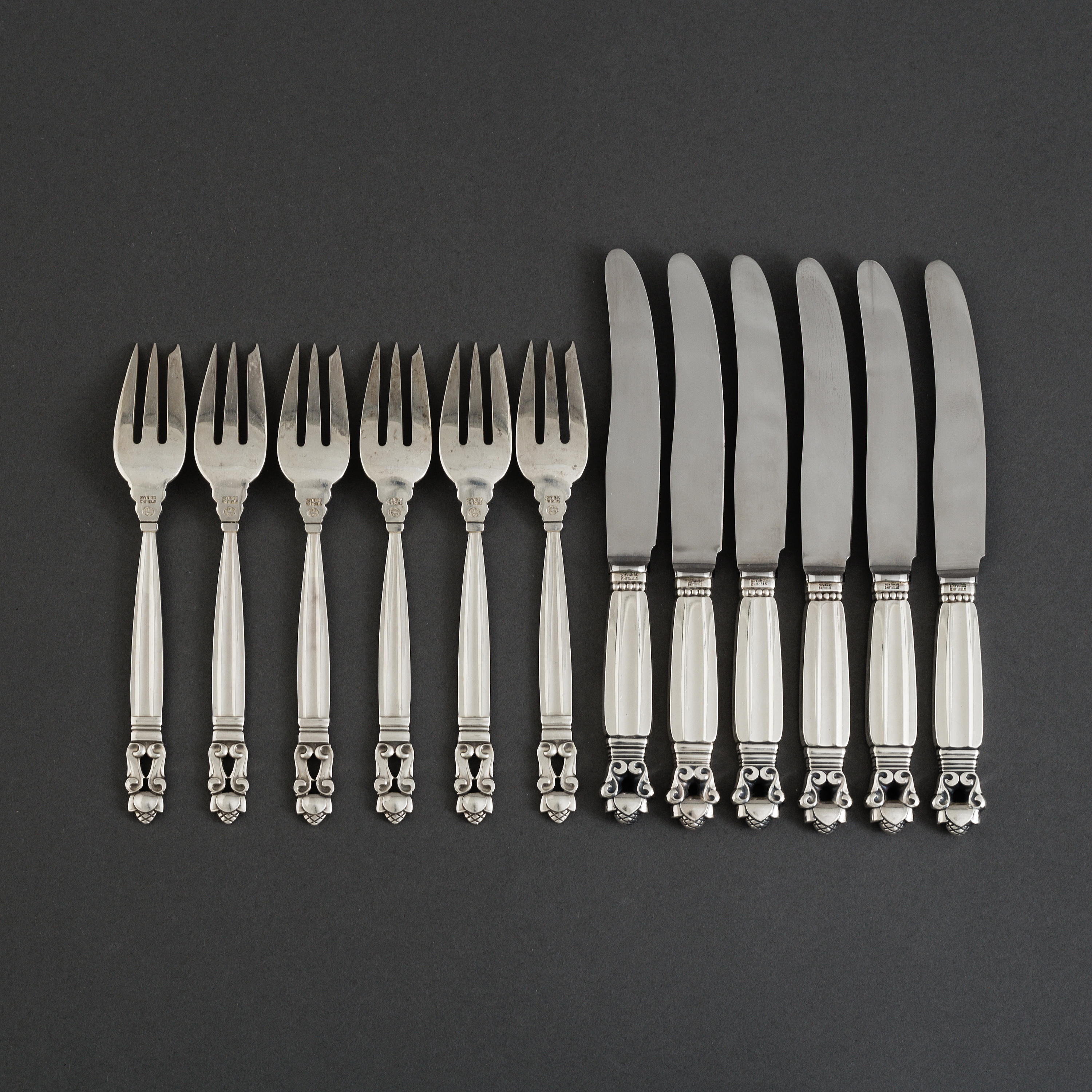 A Danish set of 12 pcs 'Acorn' sterling and stainless steel flatware