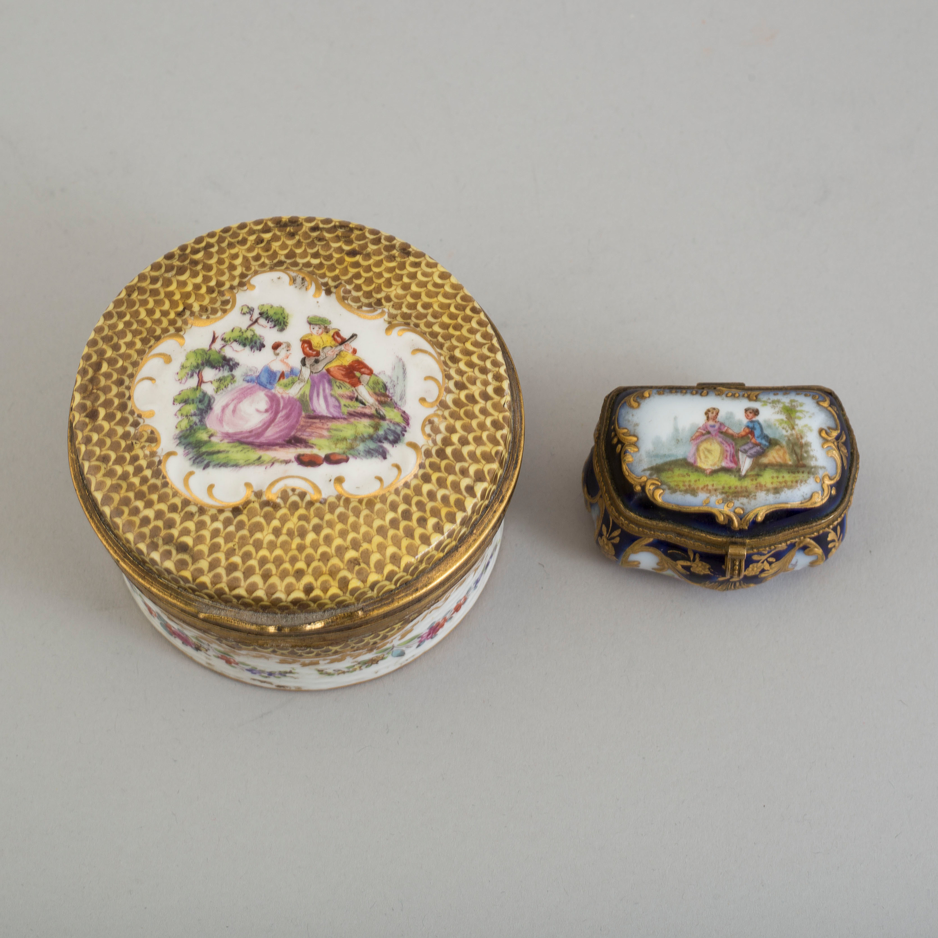 Two French painted porcelain lidded snuff boxes, one with Samson mark