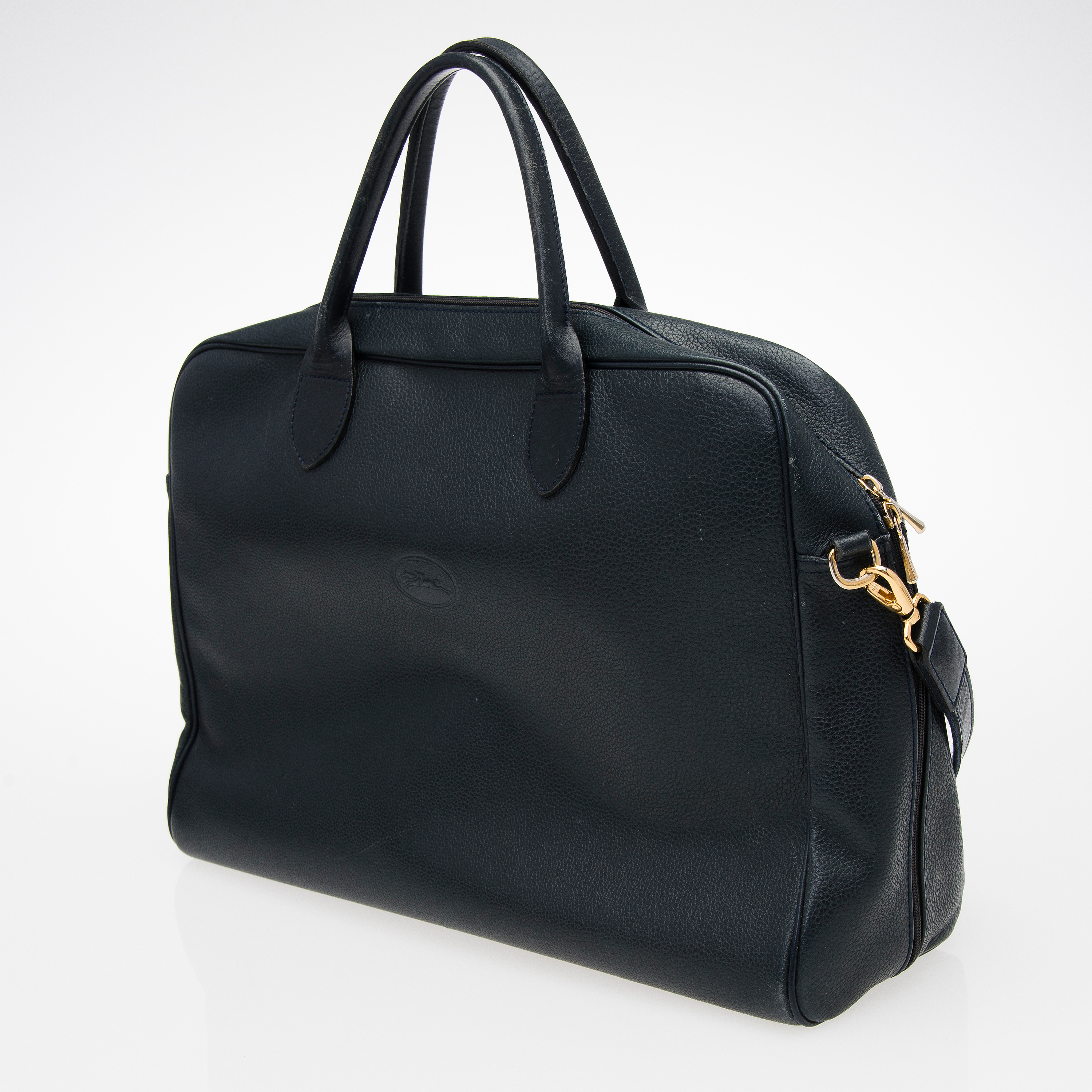 A Longchamp Briefcase and a Wallet. Bukowskis