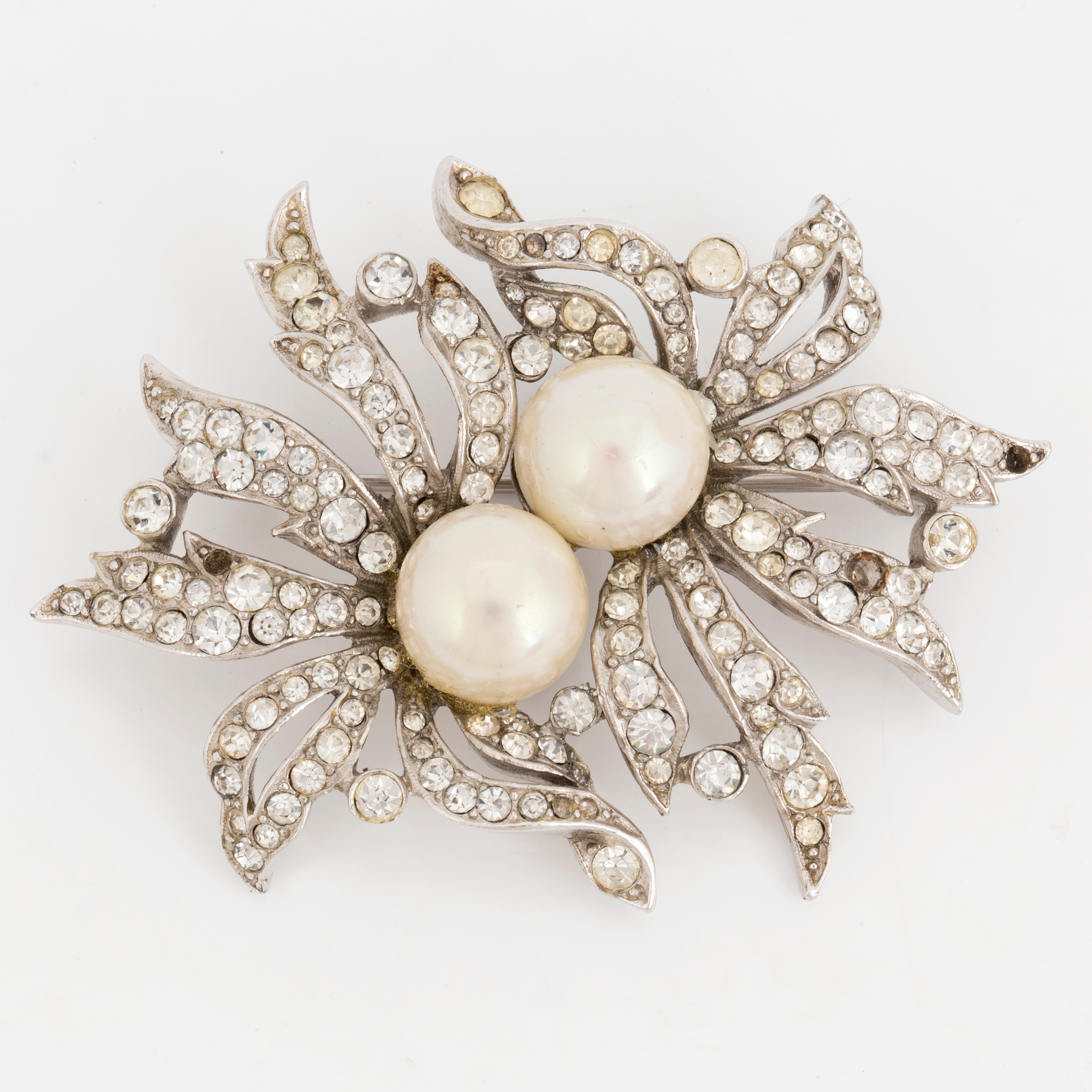 CHRISTIAN DIOR, a costume jewlery brooch by Mitchel Maer. Bukowskis