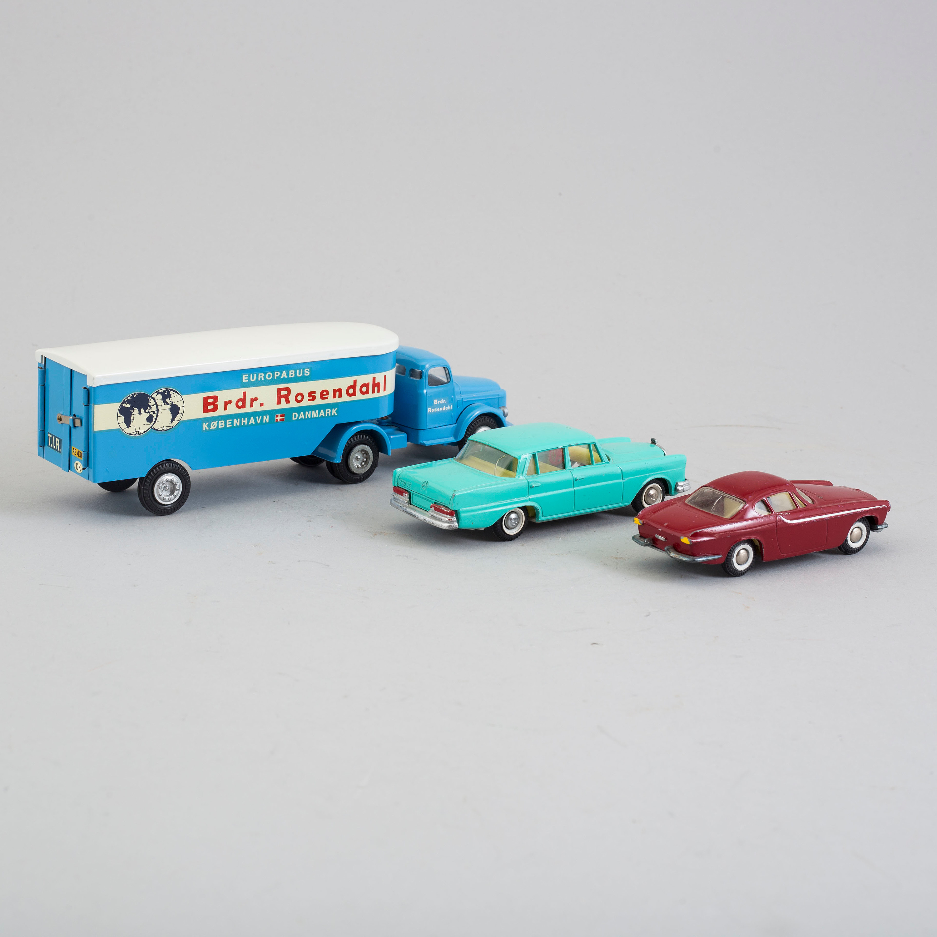 Three tin toy cars, Tekno Denmark, 1960s. Bukowskis