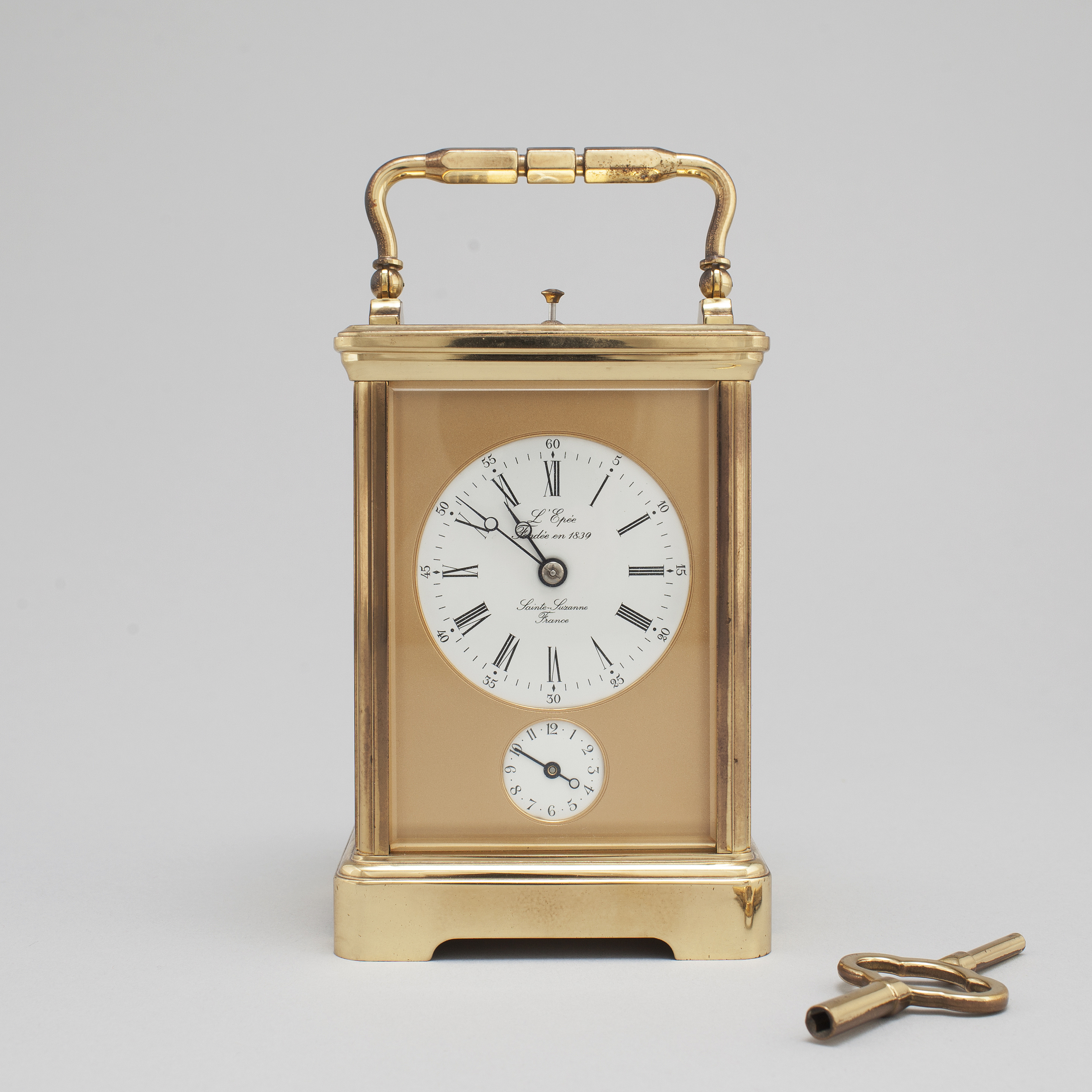 A brass carriage clock from L'Epée, France. Bukowskis