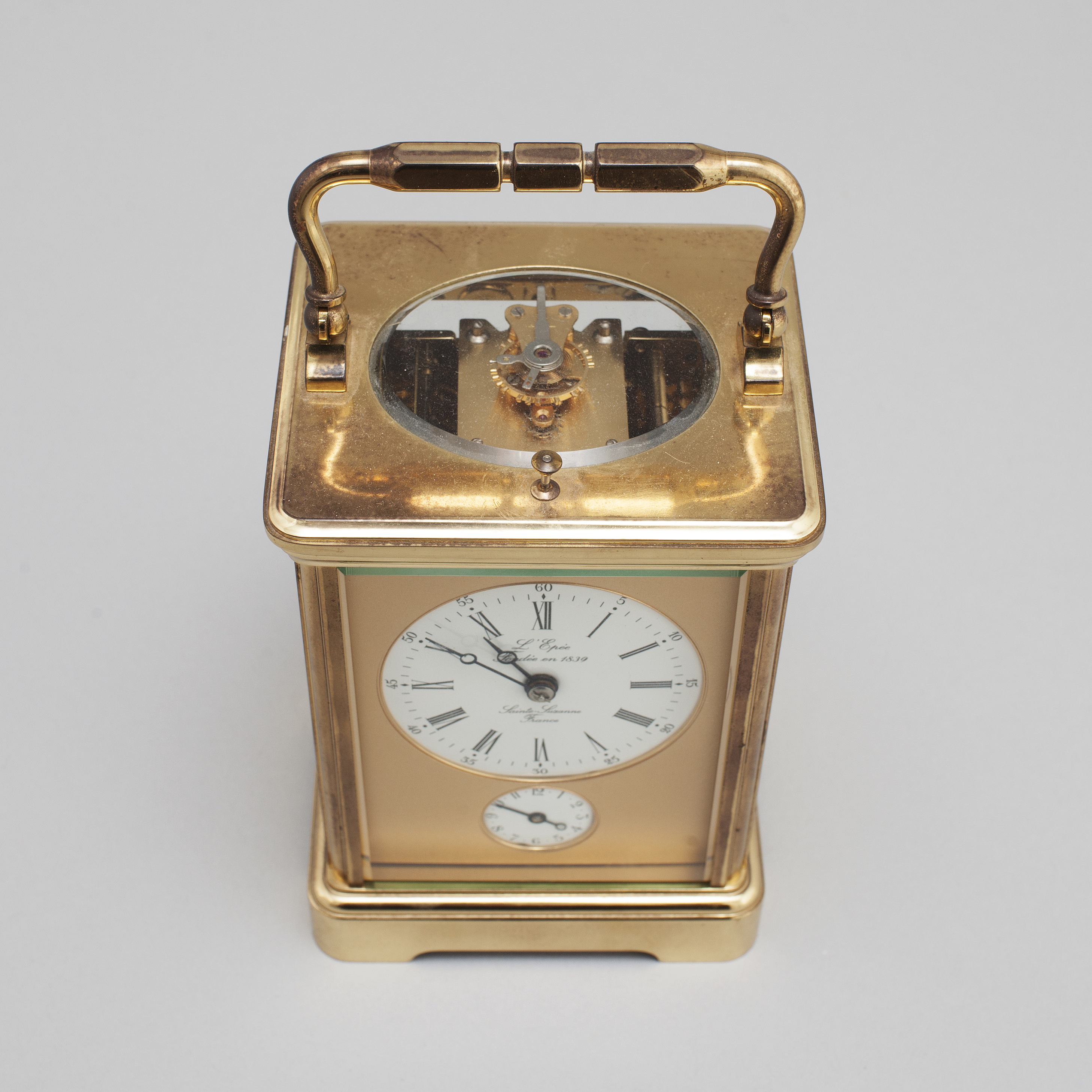 A brass carriage clock from L'Epée, France. Bukowskis