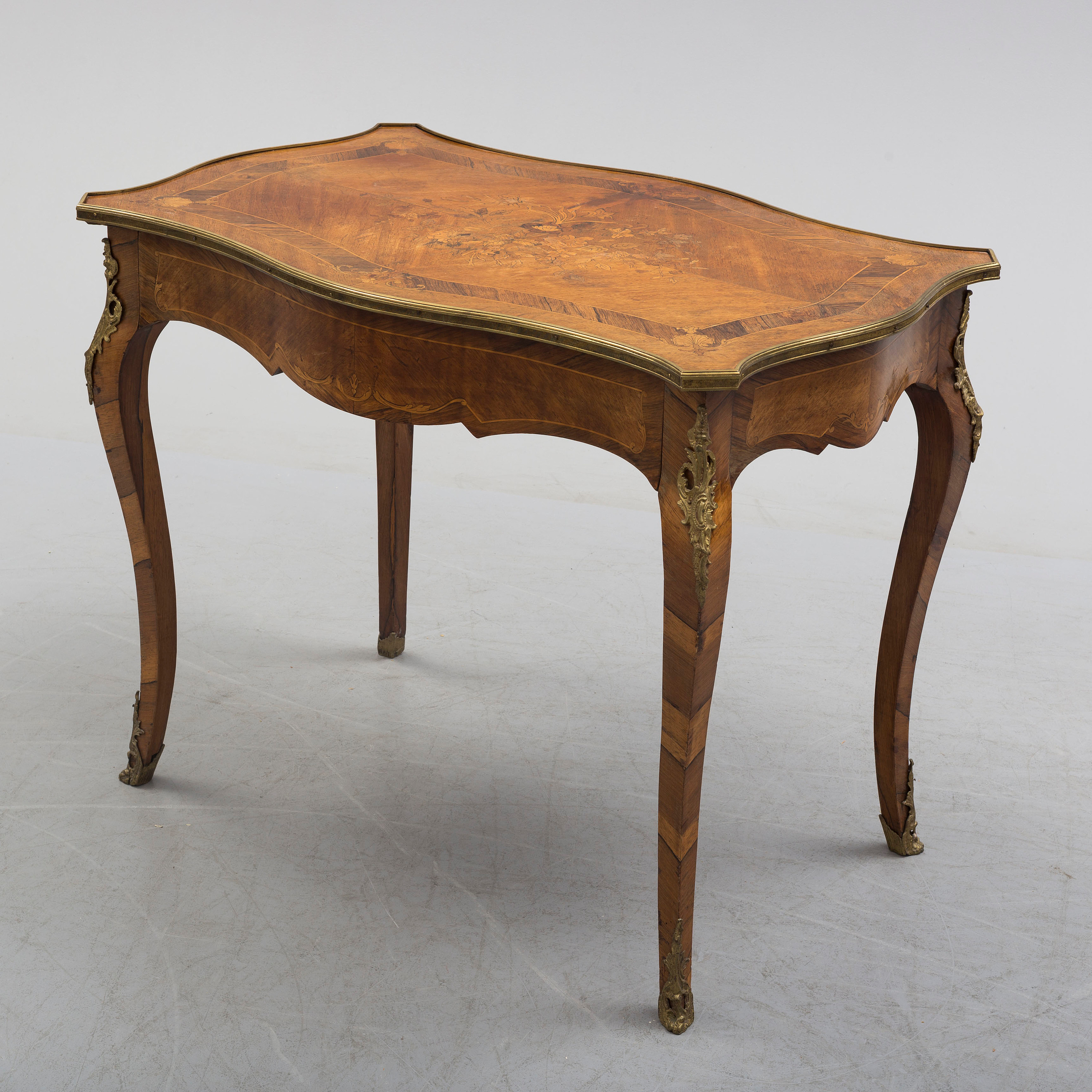 A Louis quinze style table circa 1900. Bukowskis