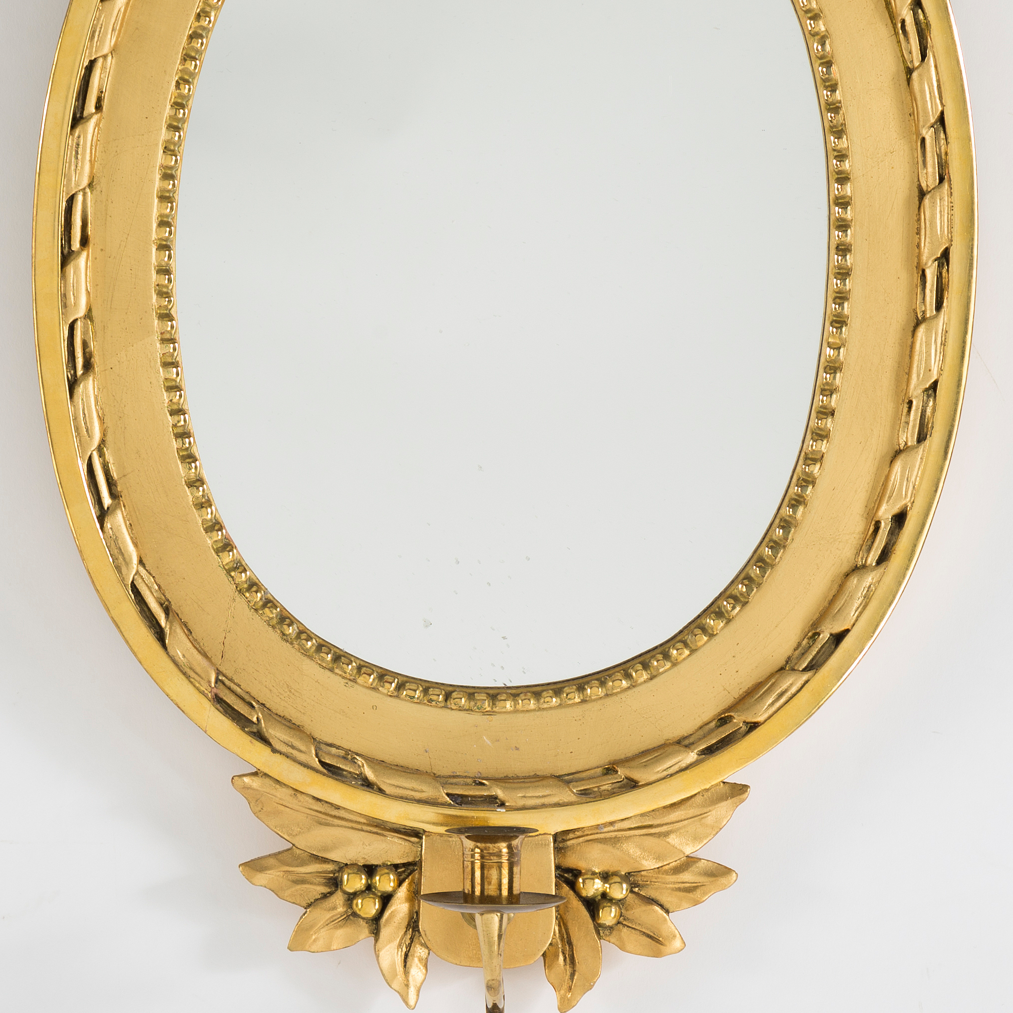 A mid 20th century Gustavian style mirror scone. Bukowskis