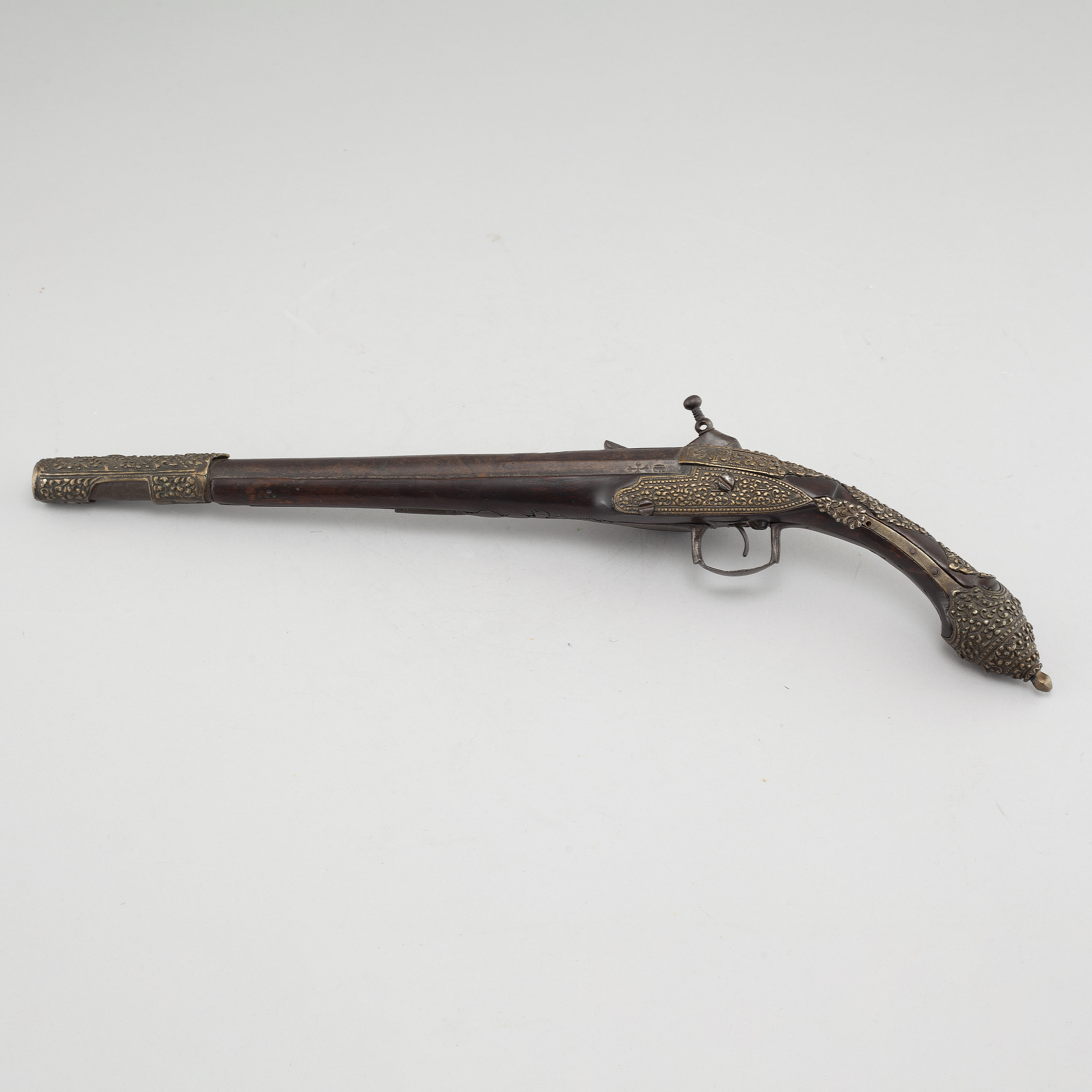A Moroccan miquelet-lock pistol,circa 1800. Two-stage barrel,octagonal A Moroccan miquelet-lock pistol,circa 1800. Two-stage barrel,octagonal