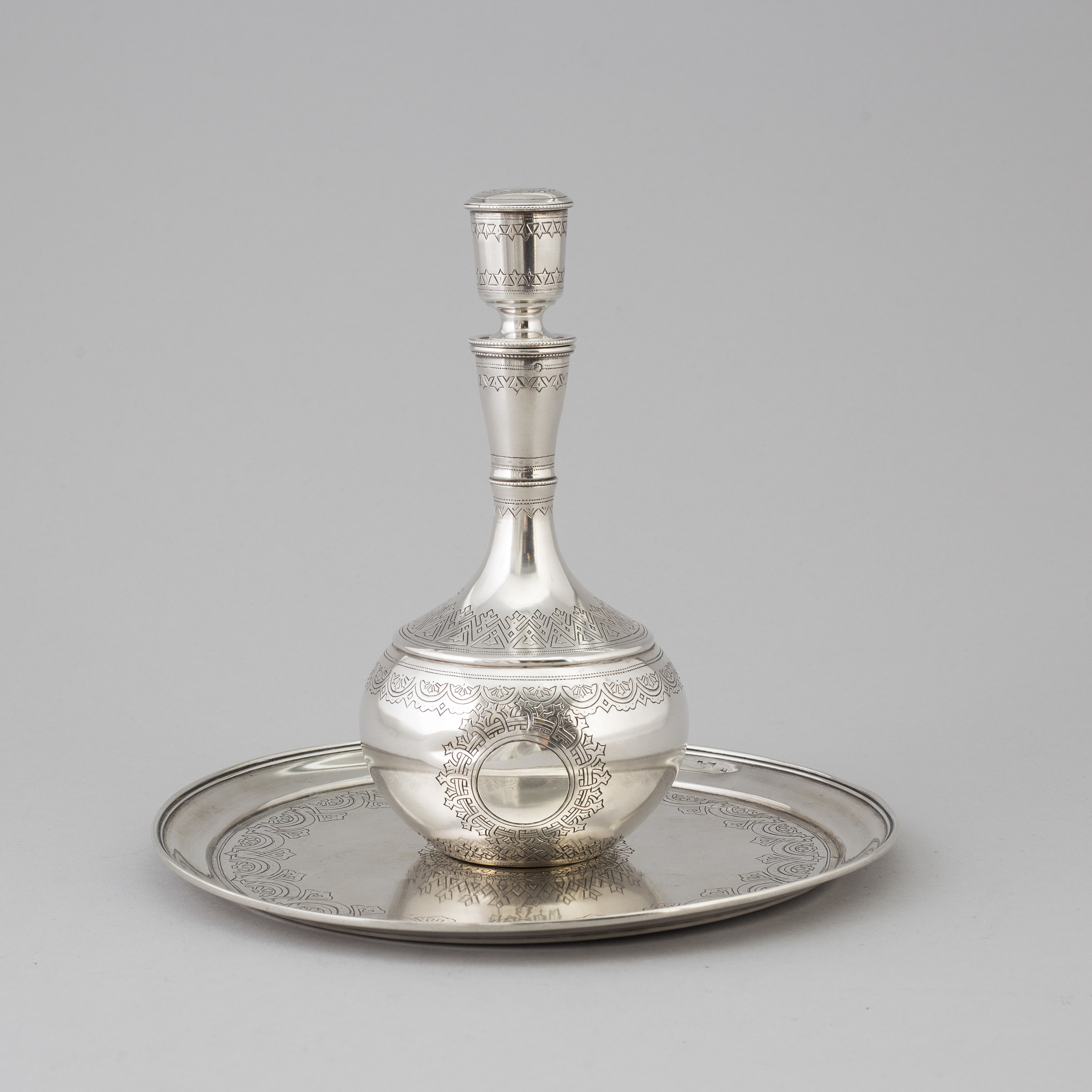 An 1888 silver decanter and plate, Russia. Bukowskis