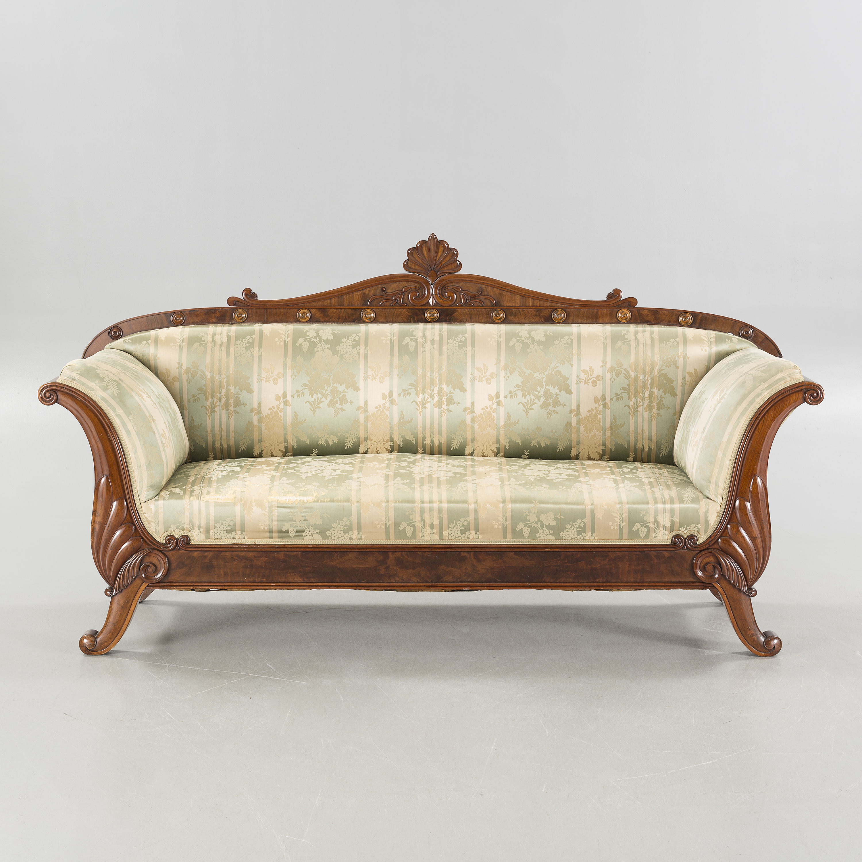 A 19th century late empire sofa. Bukowskis