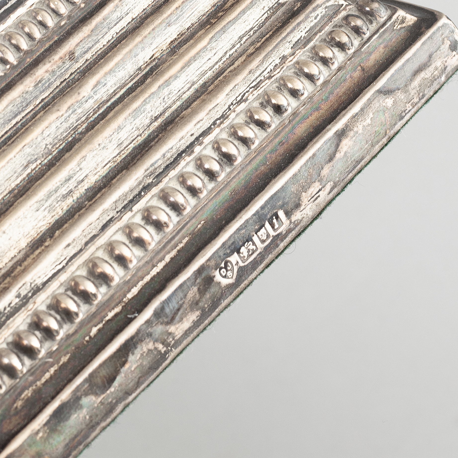 A pair of silver candlesticks made by D J Silver Repairs, Clerkenwell