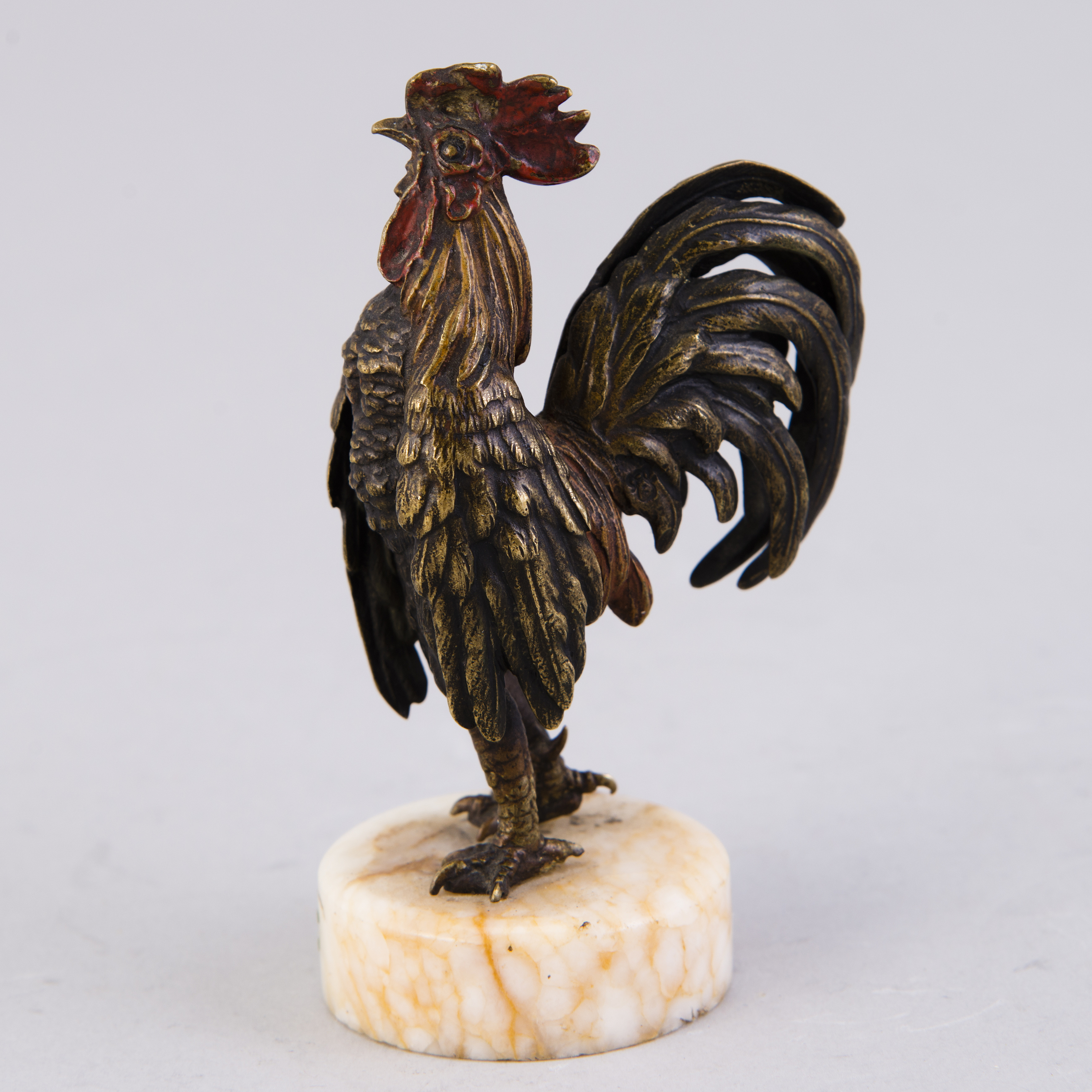 A MINIATURE SCULPTURE, painted bronze, early 20th century. Bukowskis