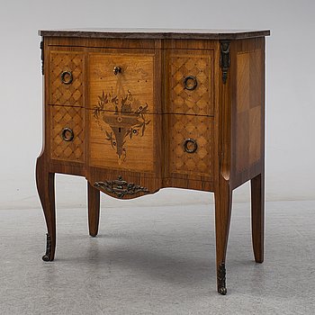 A late Gustavian style chest of drawers dated 1925.