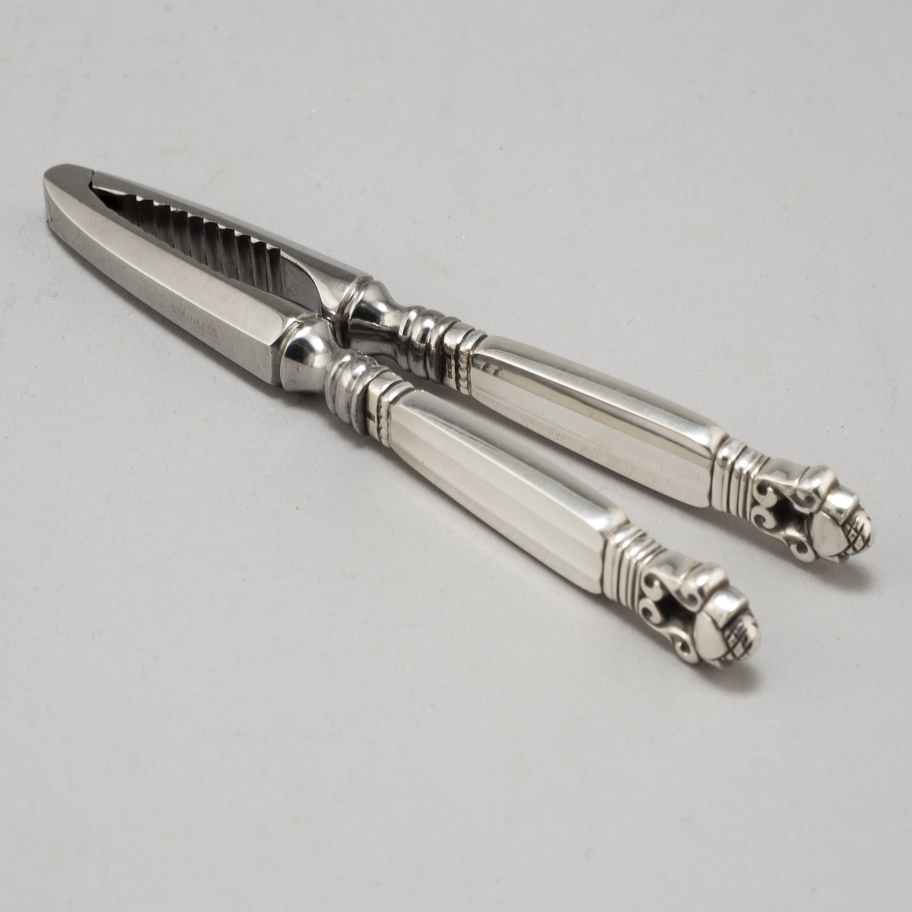 JOHAN ROHDE, a sterling silver and stainless steel "Acorn" nutcracker