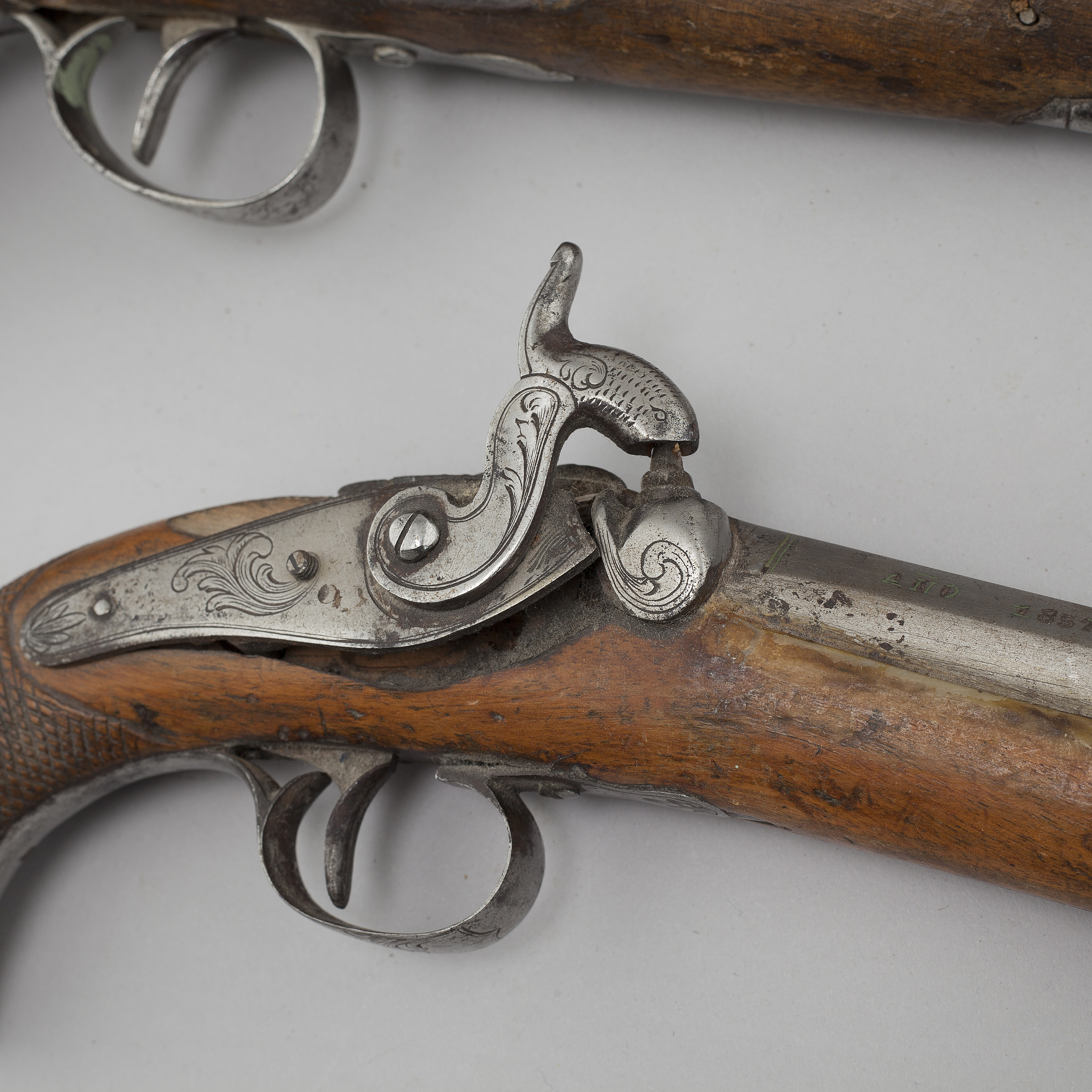 Four percussion and flintlock revolvers from the late 18th century