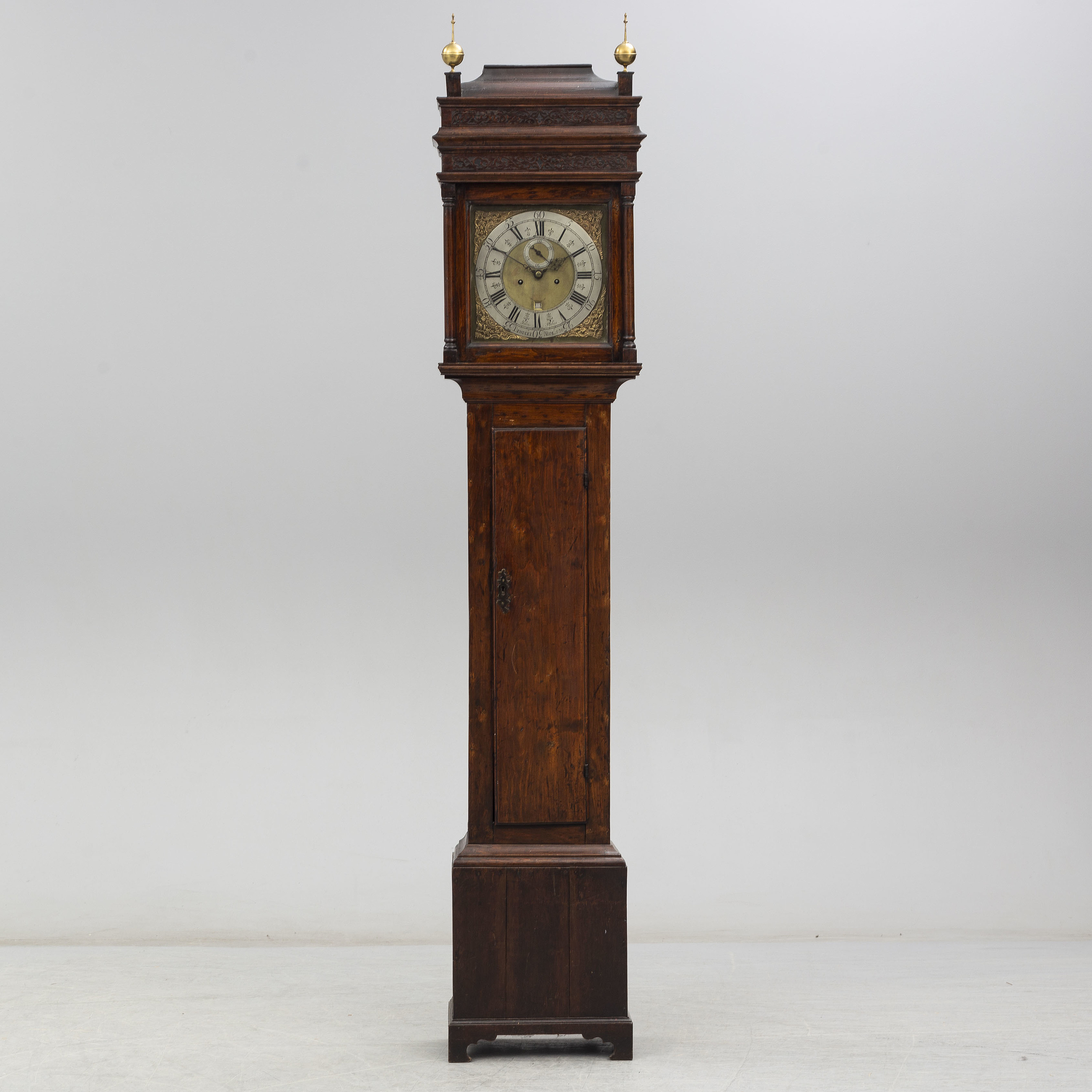 A first half of the 18th Century mahogany long case clock by John