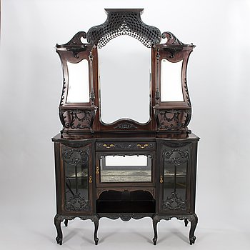 A French, late 19th Century mirrored cabinet.