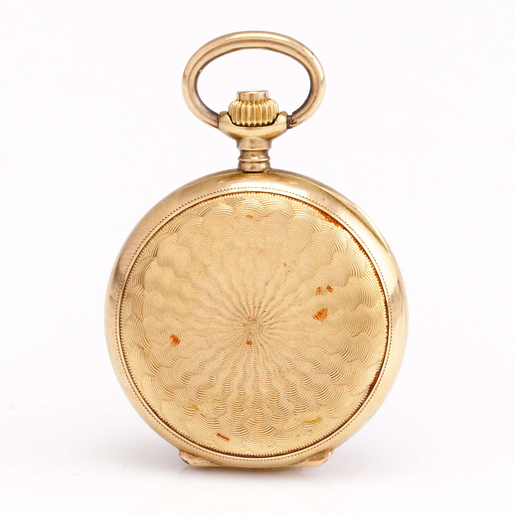 A pocket watch and a medallion. 14K gold and silver, enamel and rose