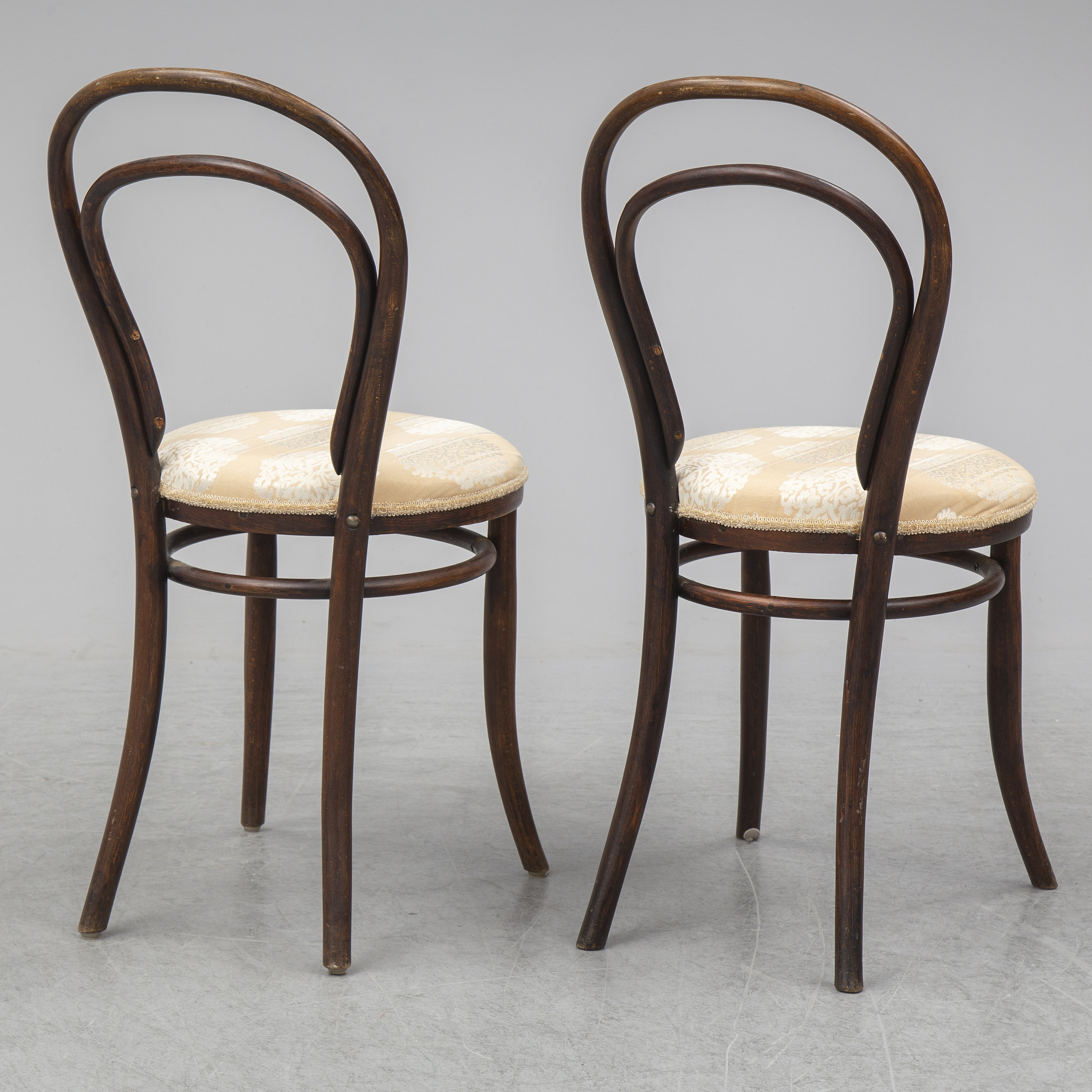 A pair of german chairs, early 20th century. Signed with labels