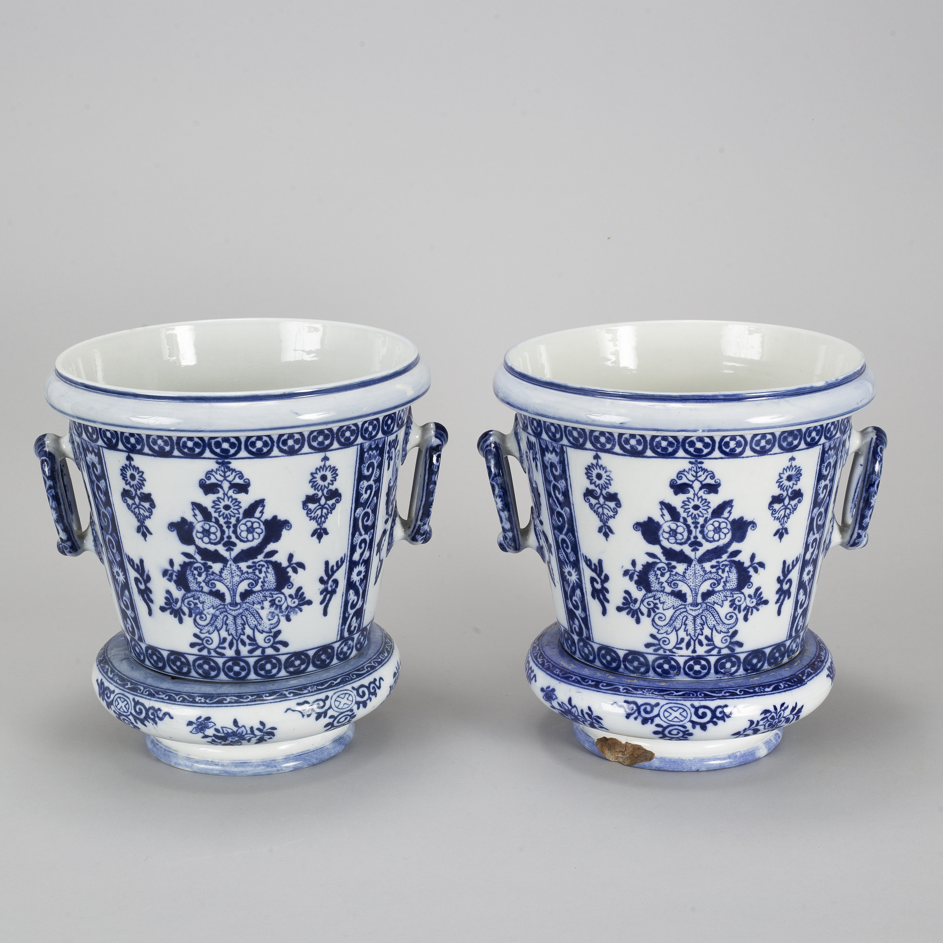 Petrus Ragout A pair of Petrus Regout & Co, Maastricht pots with bases, Delft, 20th ...