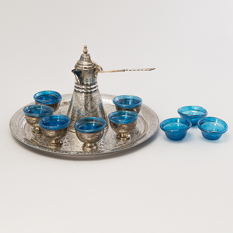 A 1970s Egyptian coffee set in silver and glass. Bukowskis
