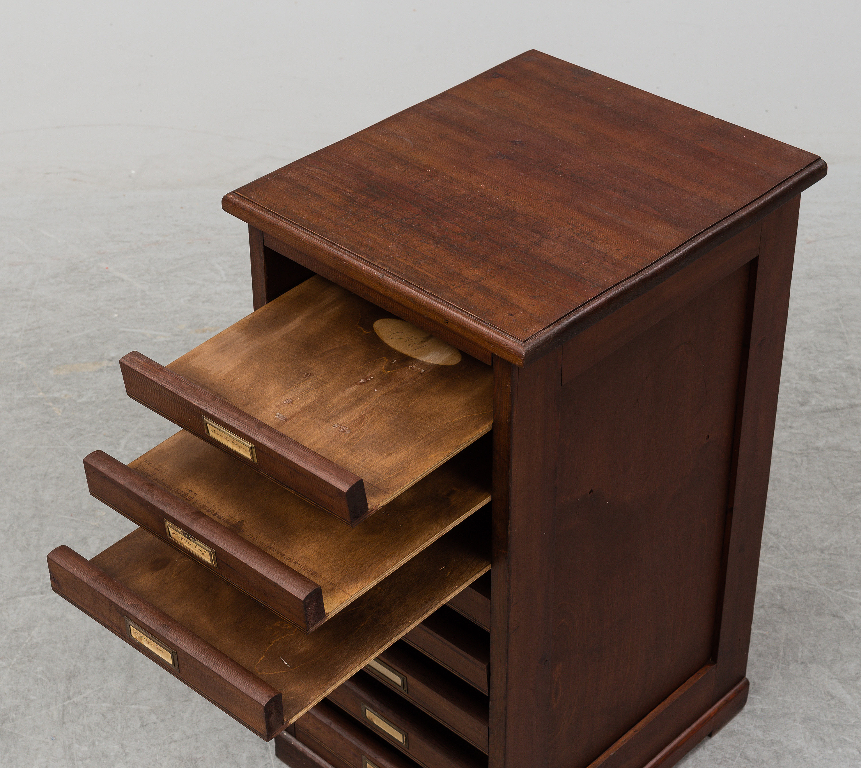 An early 20th Century stained pine office furniture. Bukowskis