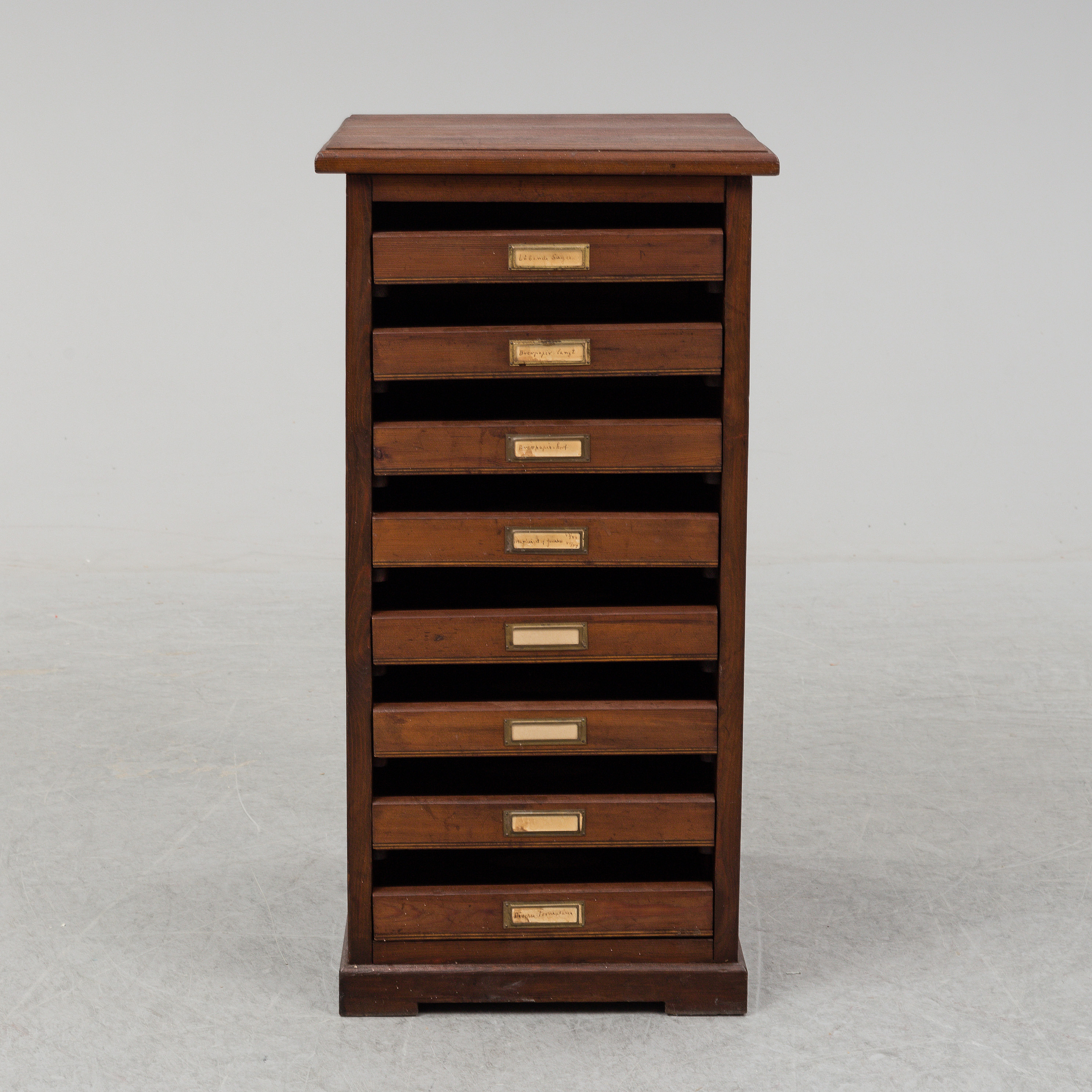 An early 20th Century stained pine office furniture. Bukowskis