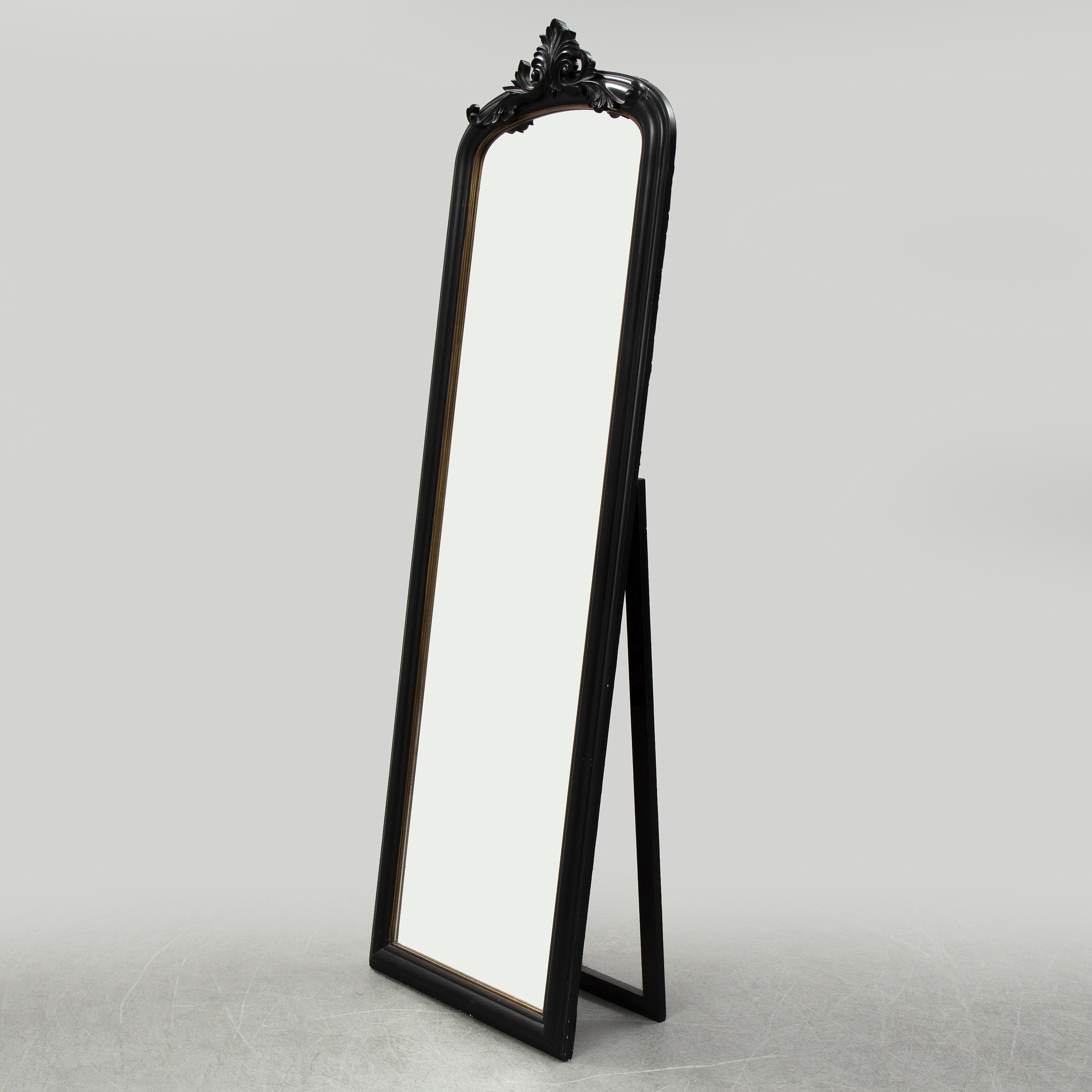 A contemporary floor mirror. Bukowskis