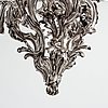 A highly important and rare Louis XV silvered brass
five-light chandelier  attributed to Pierre Boulanger, Paris c 1750.