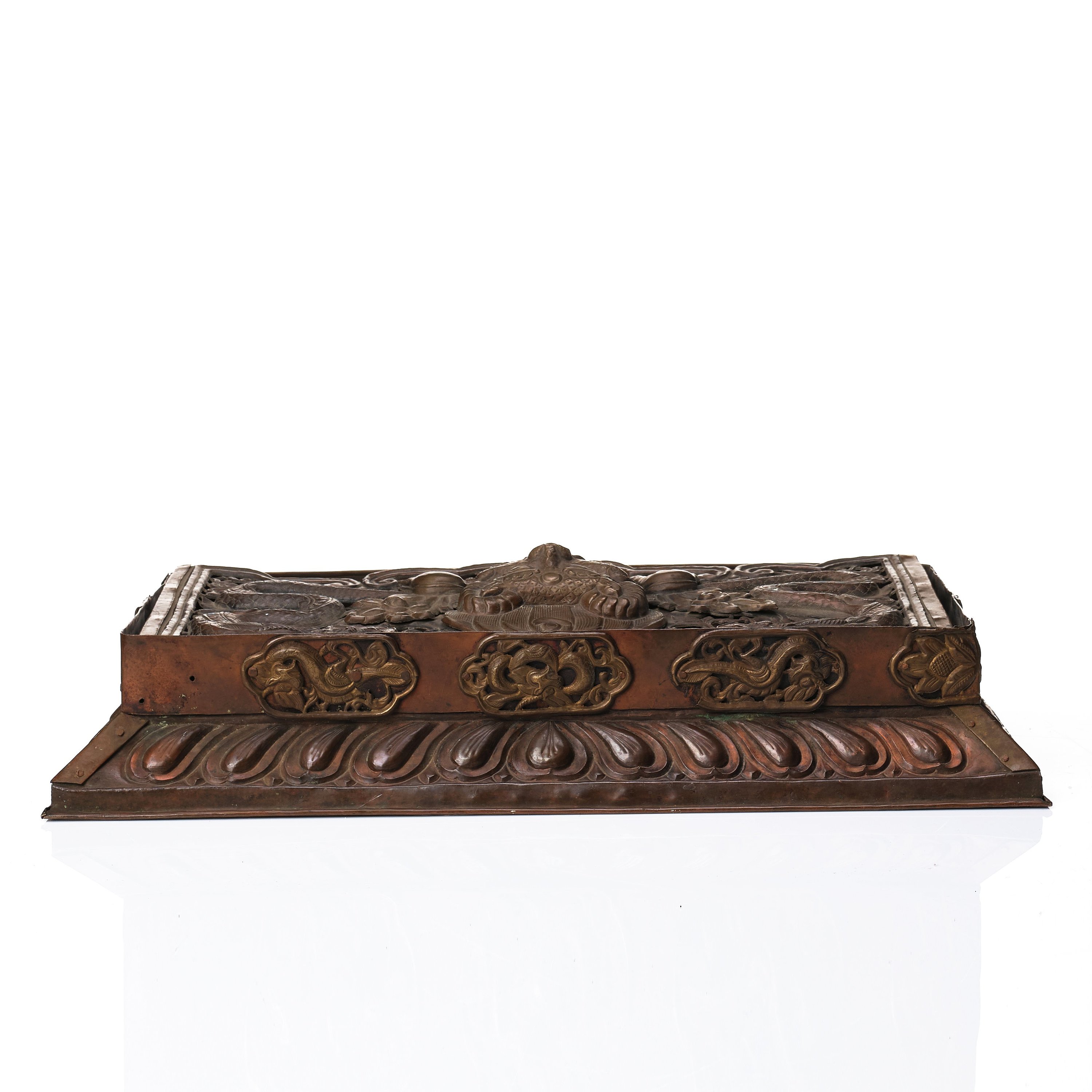 A copper alloy and brass ritual folding table, Tibet/Nepal, 1900tal