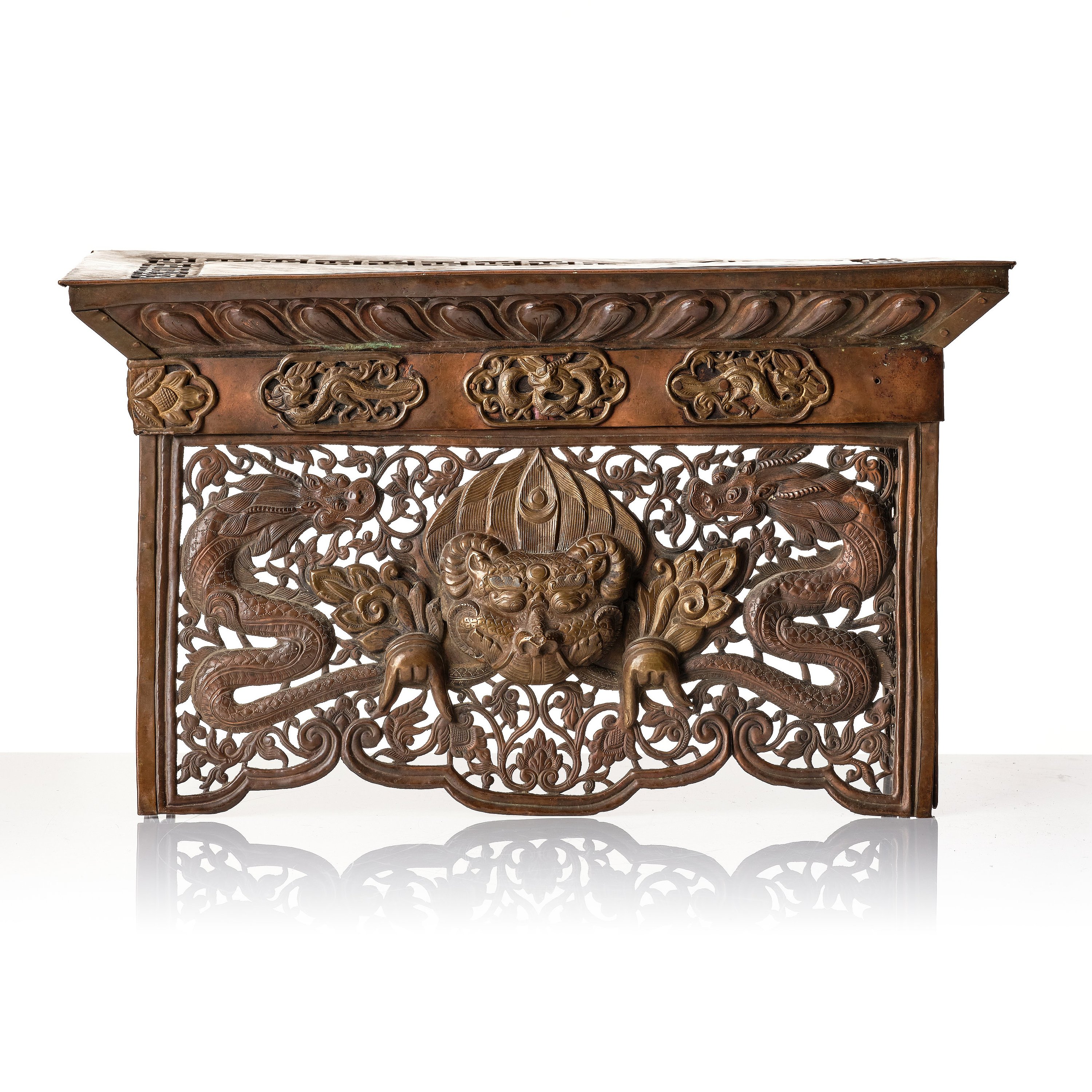 A copper alloy and brass ritual folding table, Tibet/Nepal, 1900tal