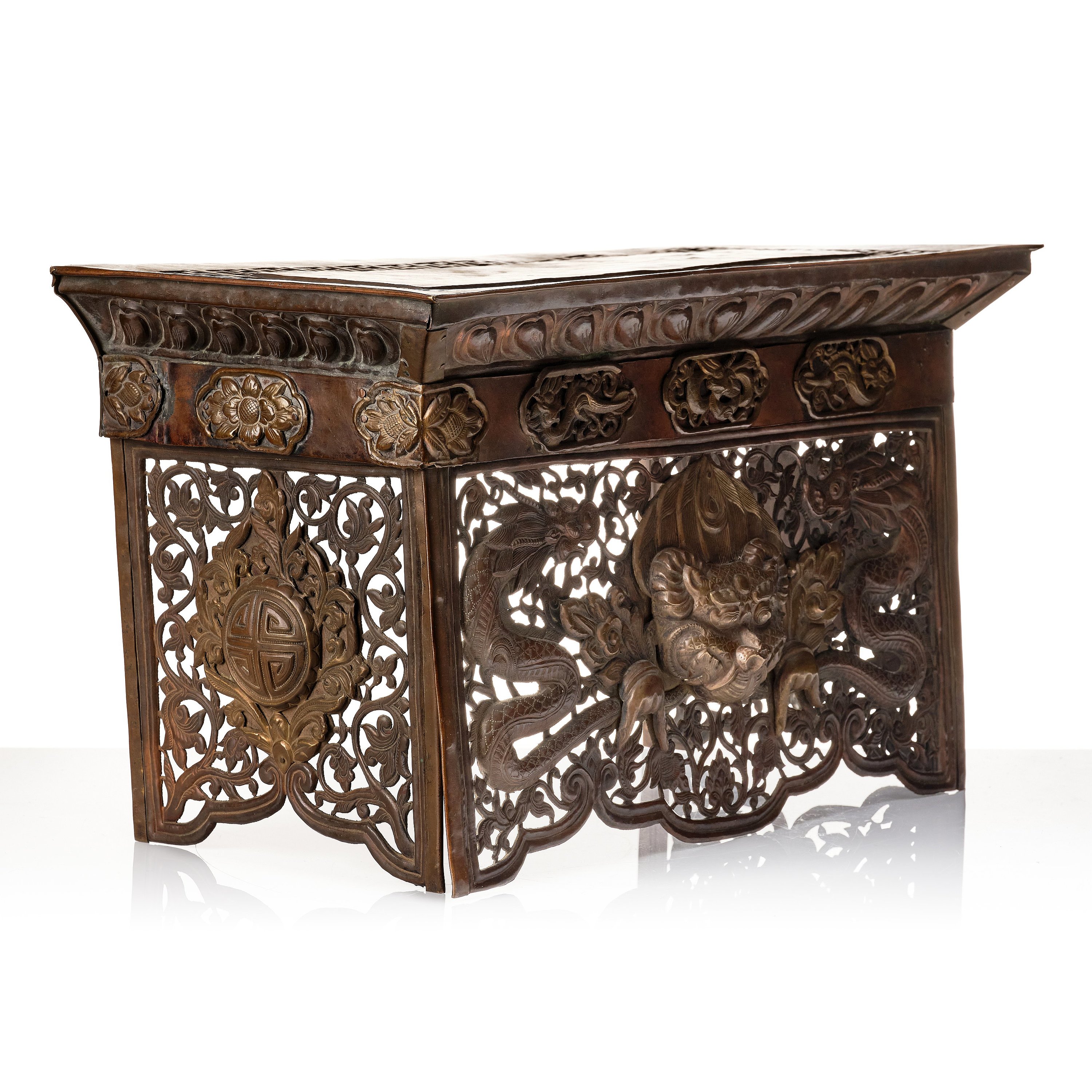 A copper alloy and brass ritual folding table, Tibet/Nepal, 1900tal