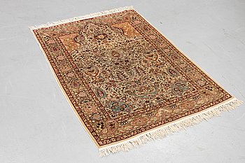 A rug, Old silk Hereke, ca 152 x 110 cm.