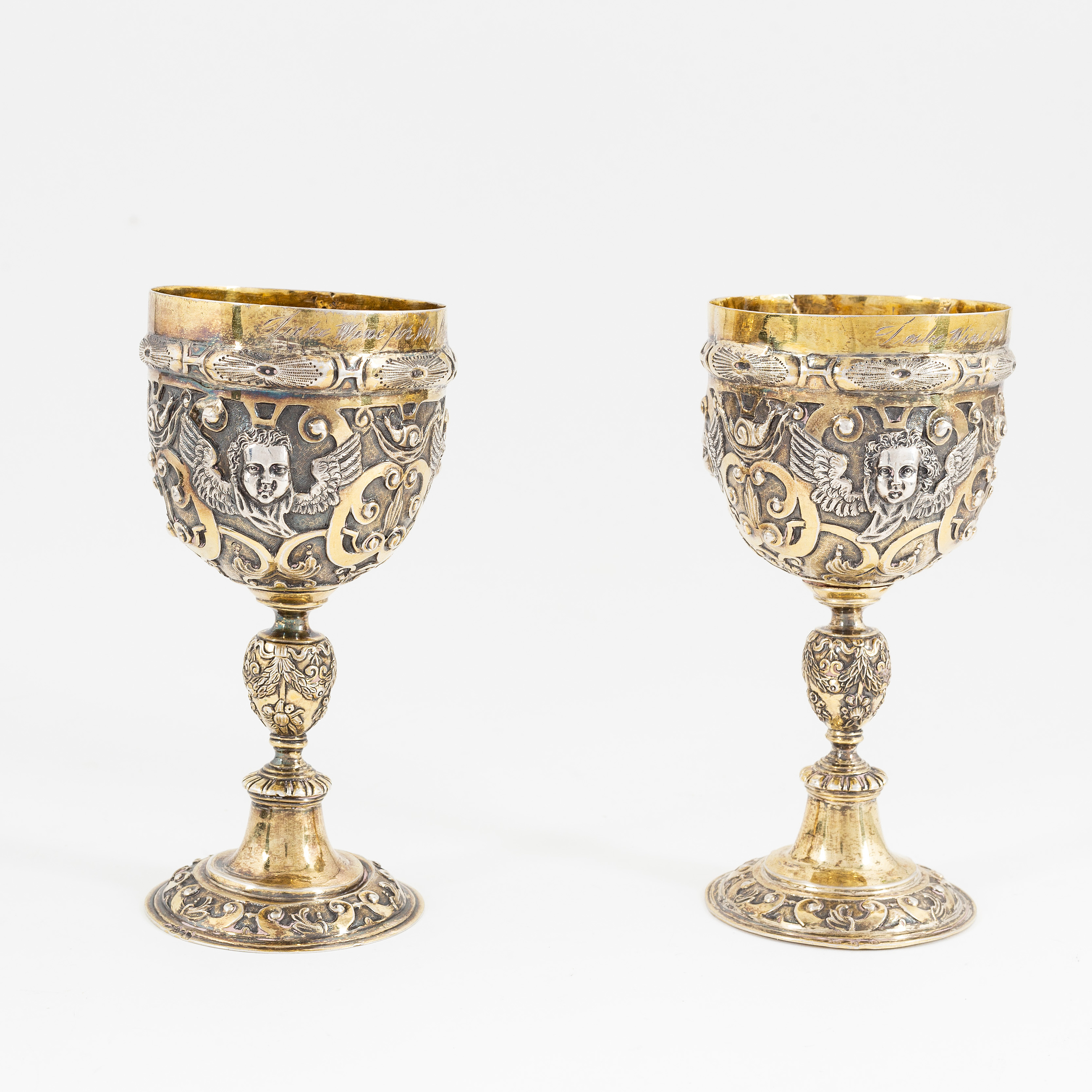 A pair of probably 19th Century parcelgilt silver cups. Renaissance