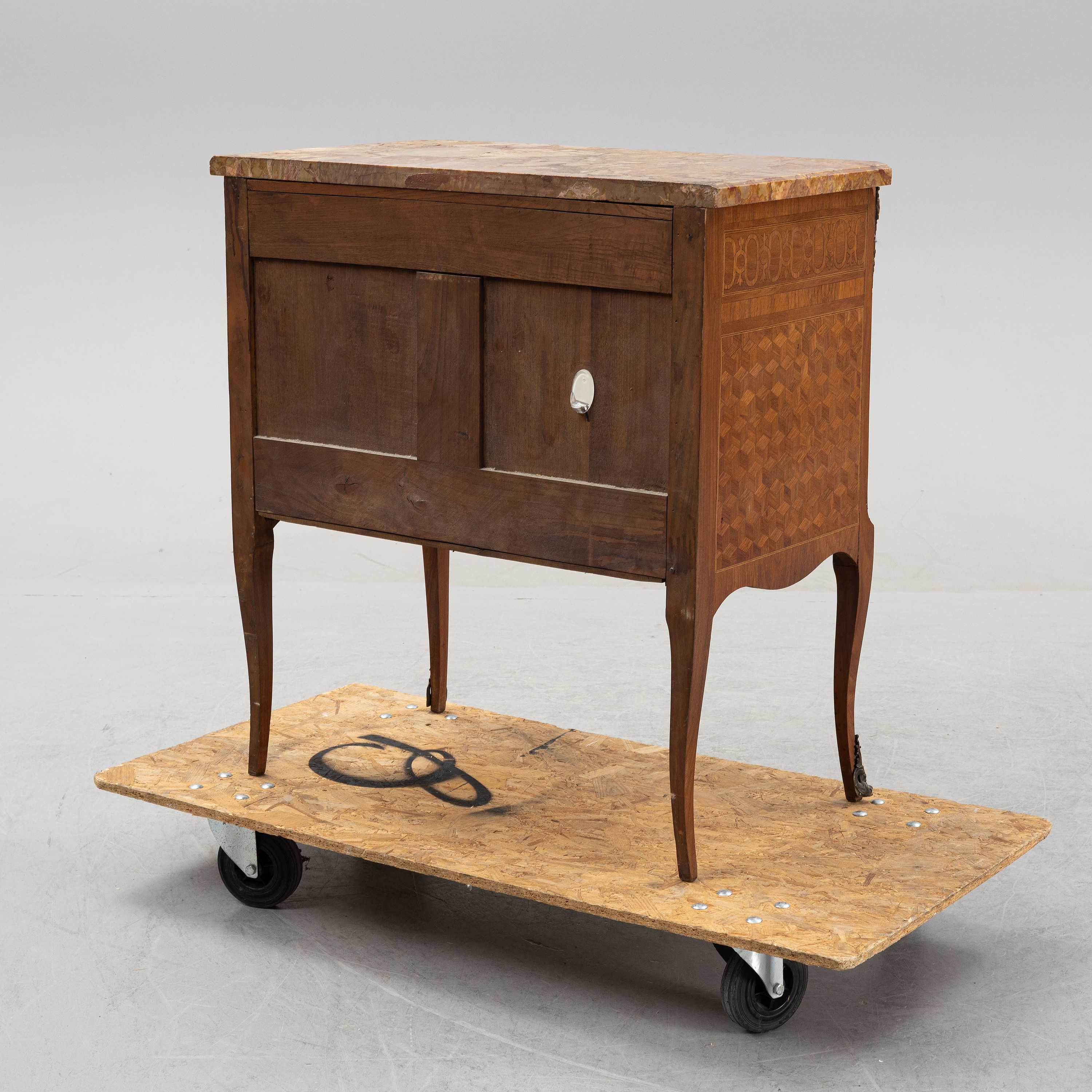 A 20th Century Gustavian style dresser with a stone top. Bukowskis