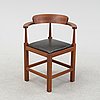 Torbjörn Ahlström, a mahogany chair.