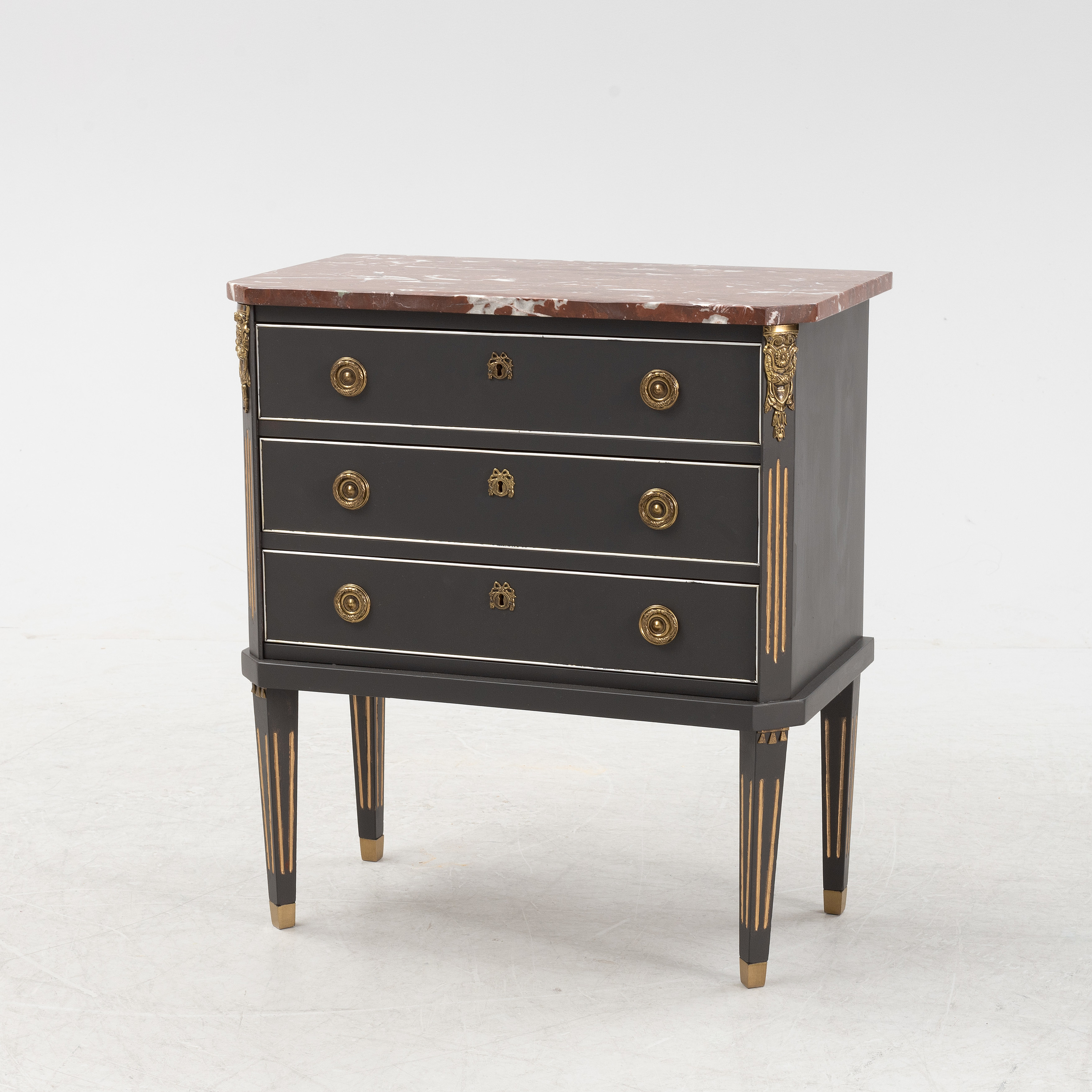 A 20th Century Gustavian style dresser with a stone top. Bukowskis