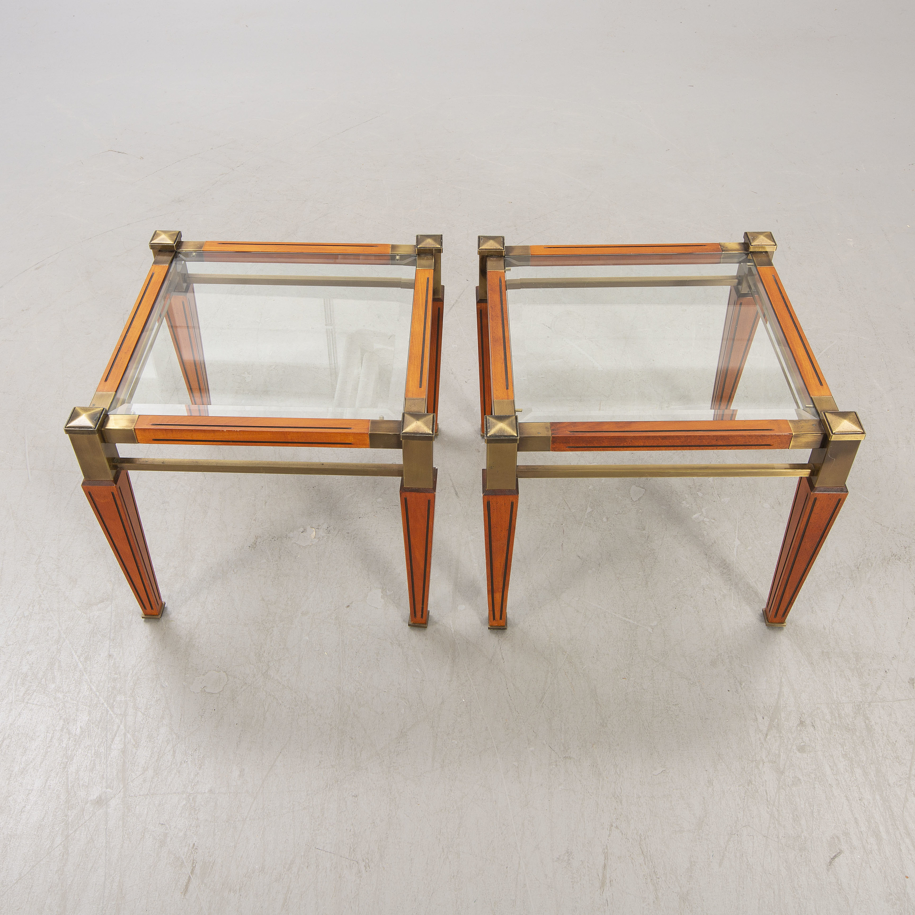 A pair of brass and wood side tables later part of the 20th century