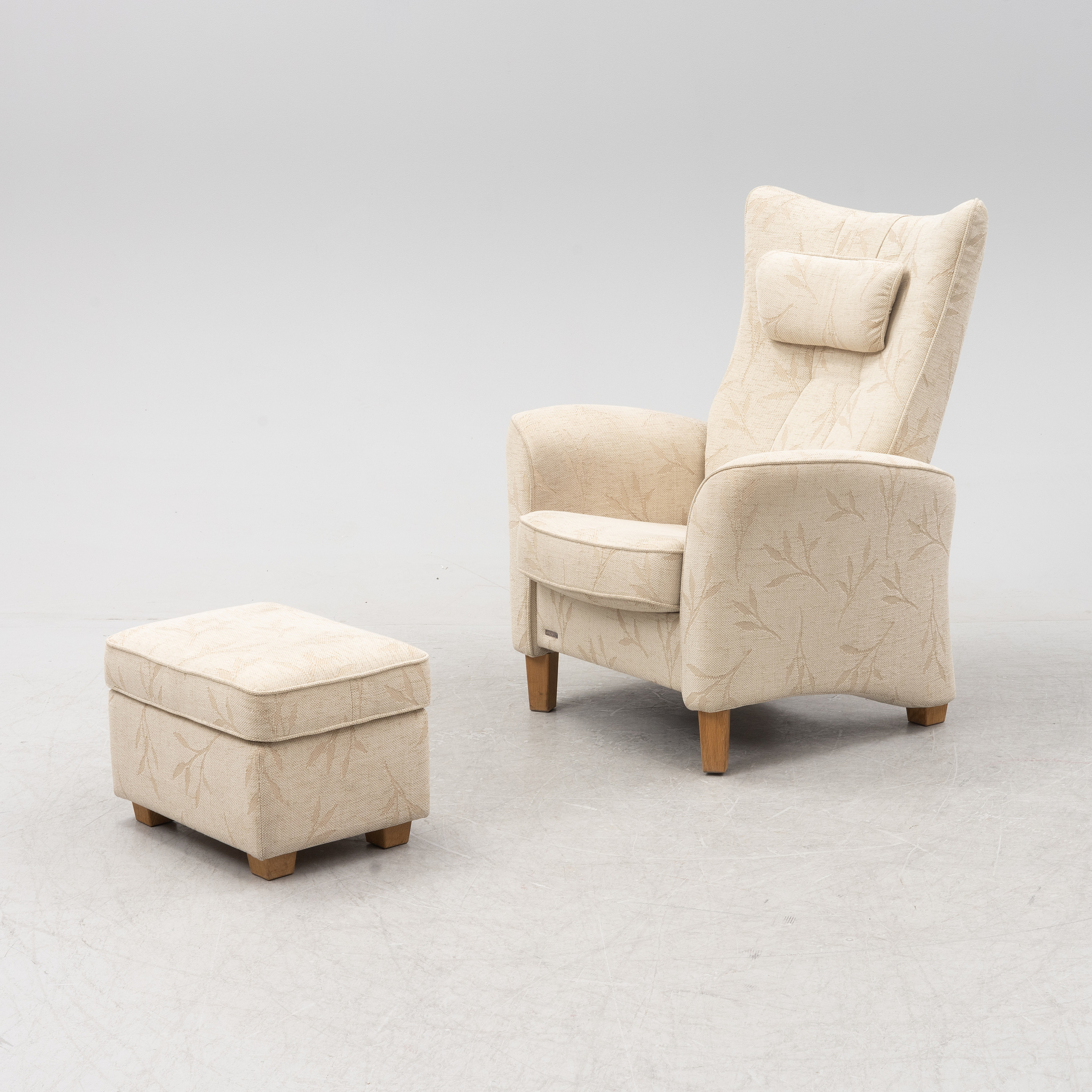 An easy chair and a stool, Brunstad, Norway. - Bukowskis
