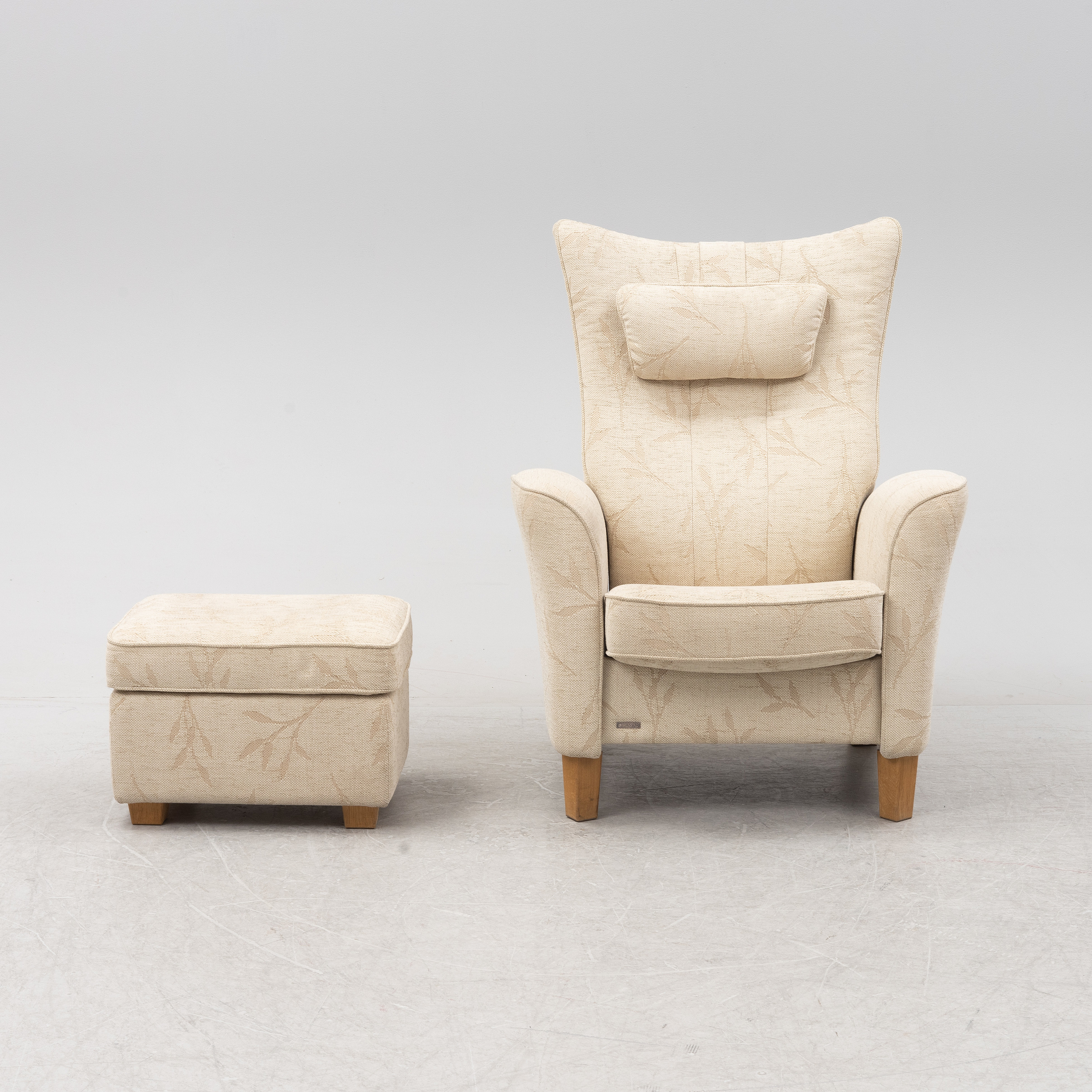 An easy chair and a stool, Brunstad, Norway. - Bukowskis