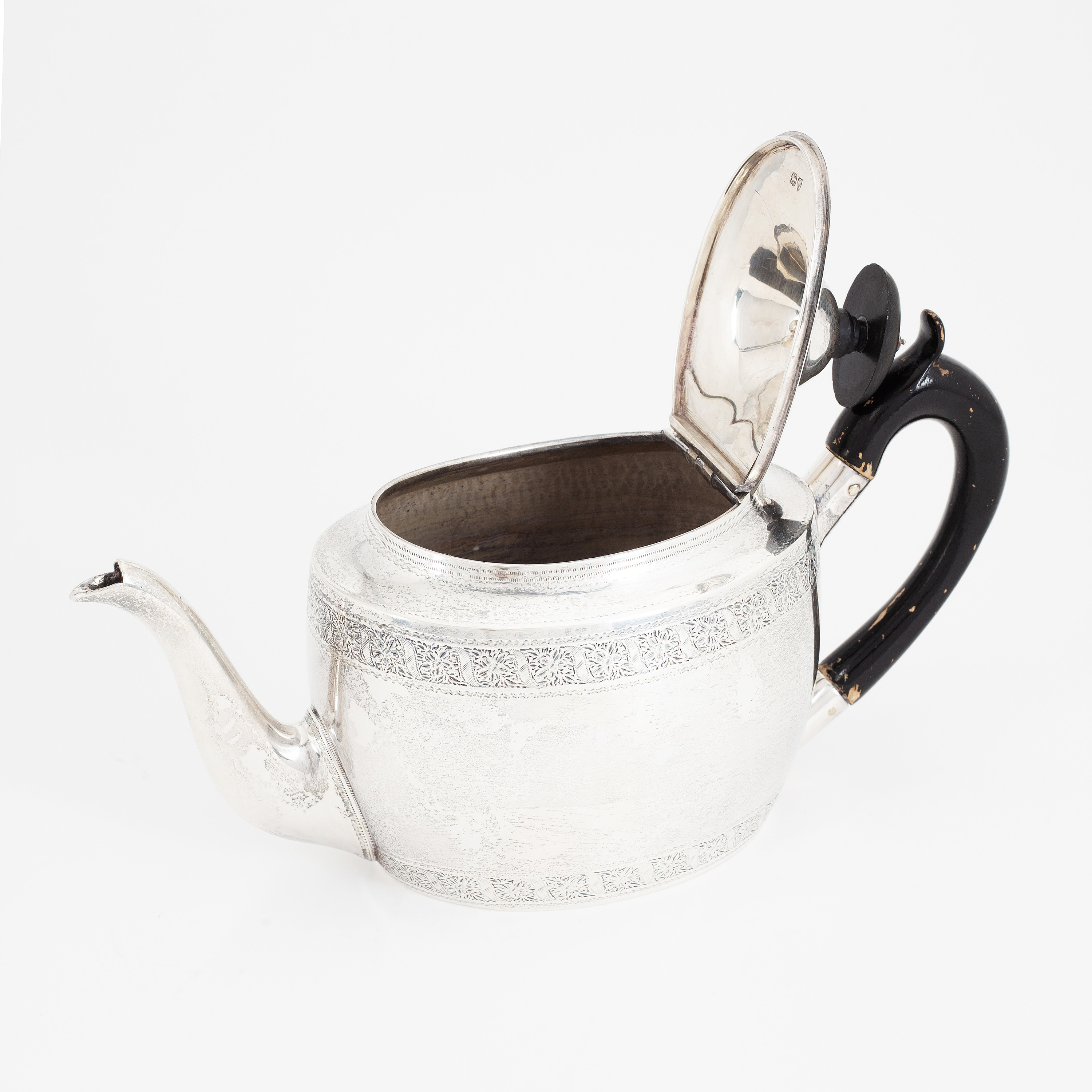 An English silver teapot, mark of Holland, Son & Slater (John