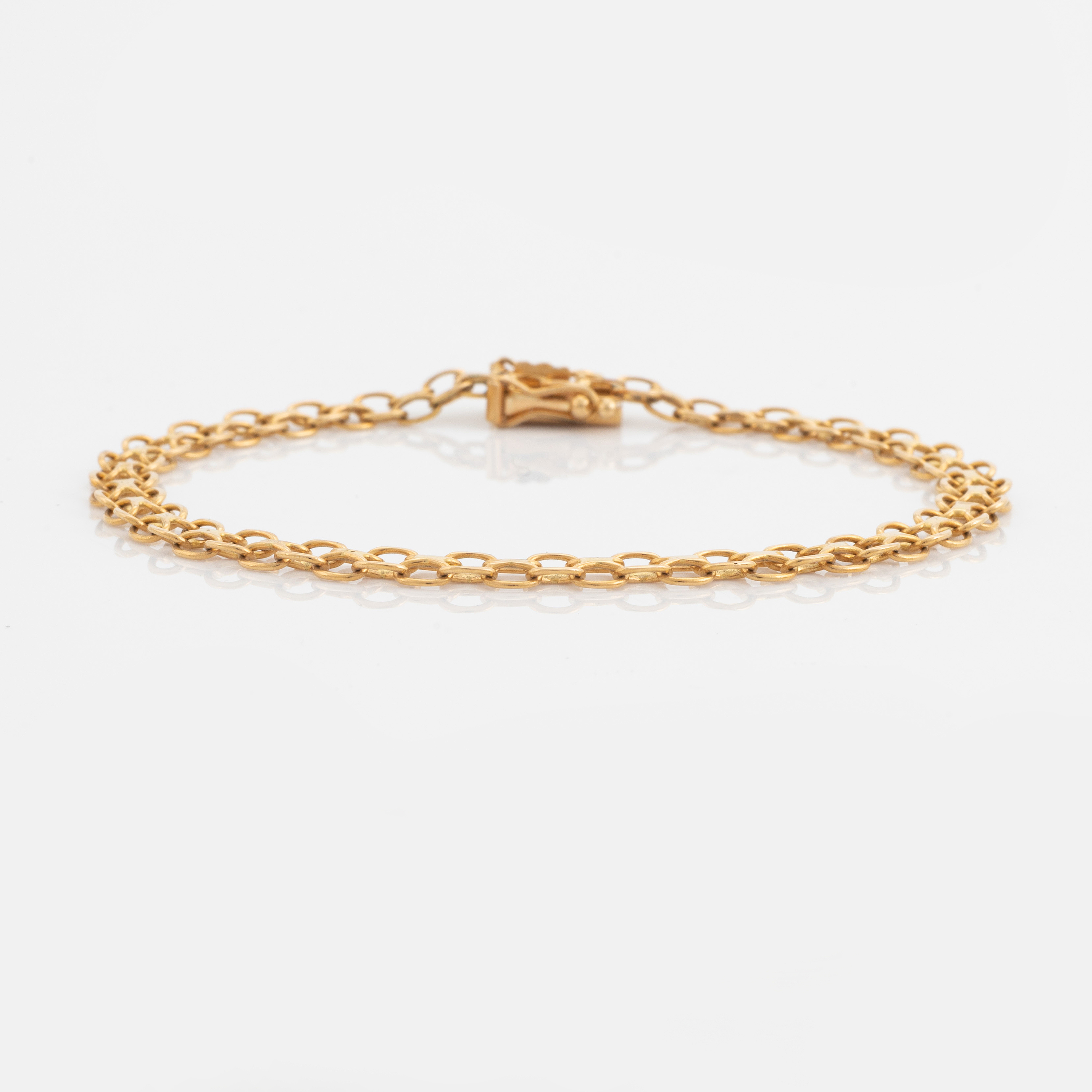 18K gold bracelet. Bukowskis