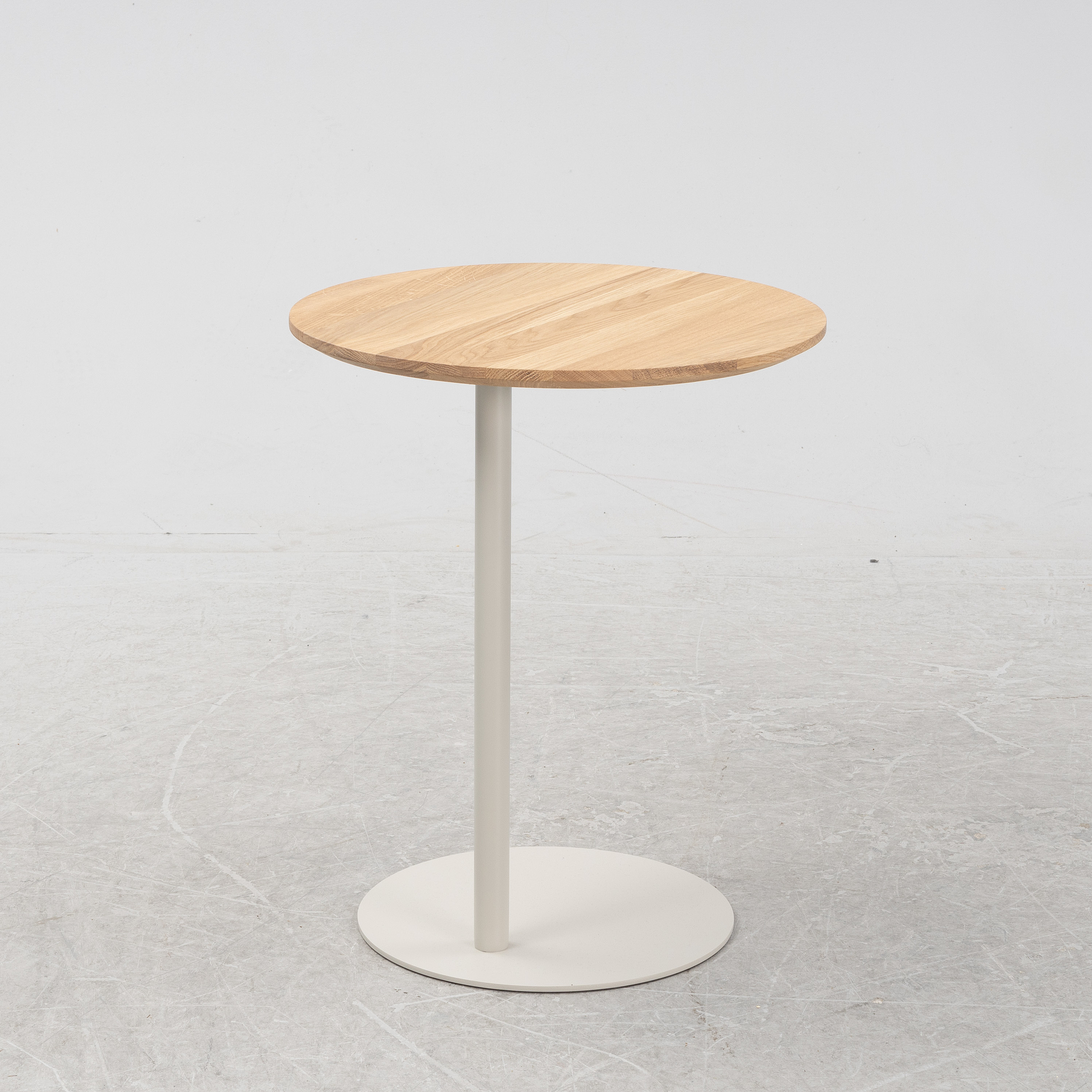 A contemporary 'Pillar' oak and steel side table by Michael H Nielsen