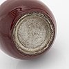A sang de boef glazed vase, Qing dynasty, circa 1900.