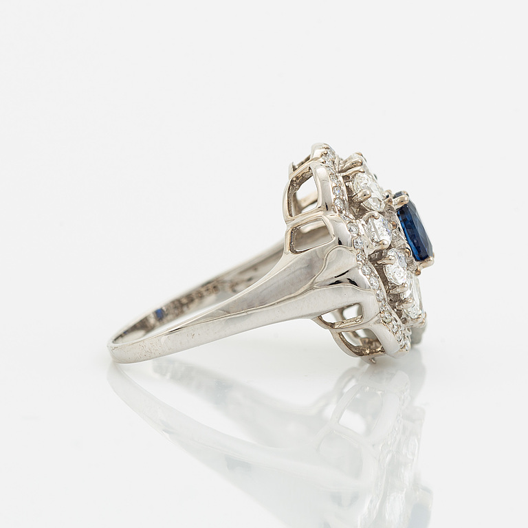 Sapphire and pear and brilliant cut diamond ring.