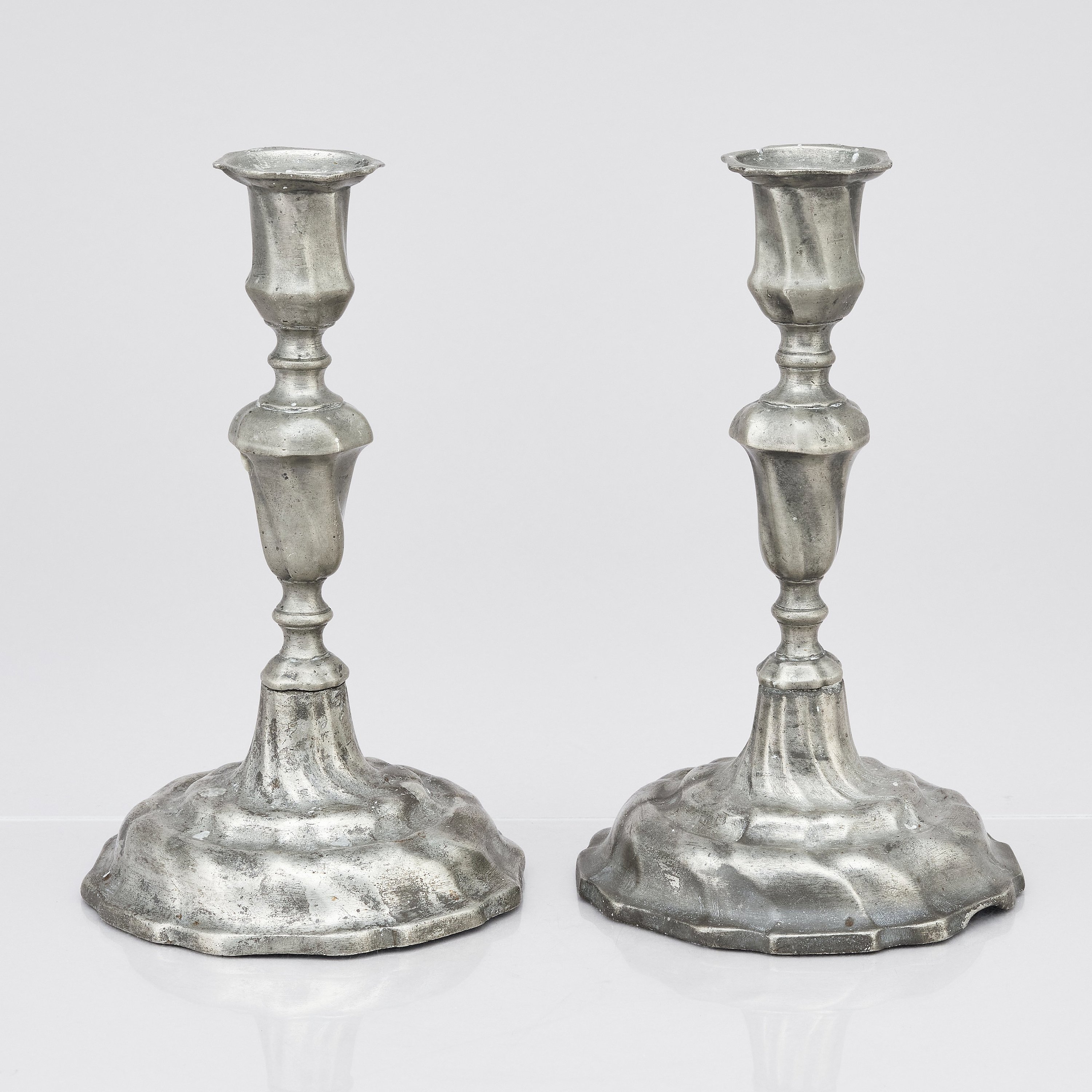 a-pair-of-rococo-pewter-candlesticks-by-b-st-hlstr-m-kalmar-1762